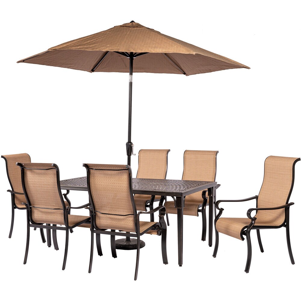 brown patio set with umbrella