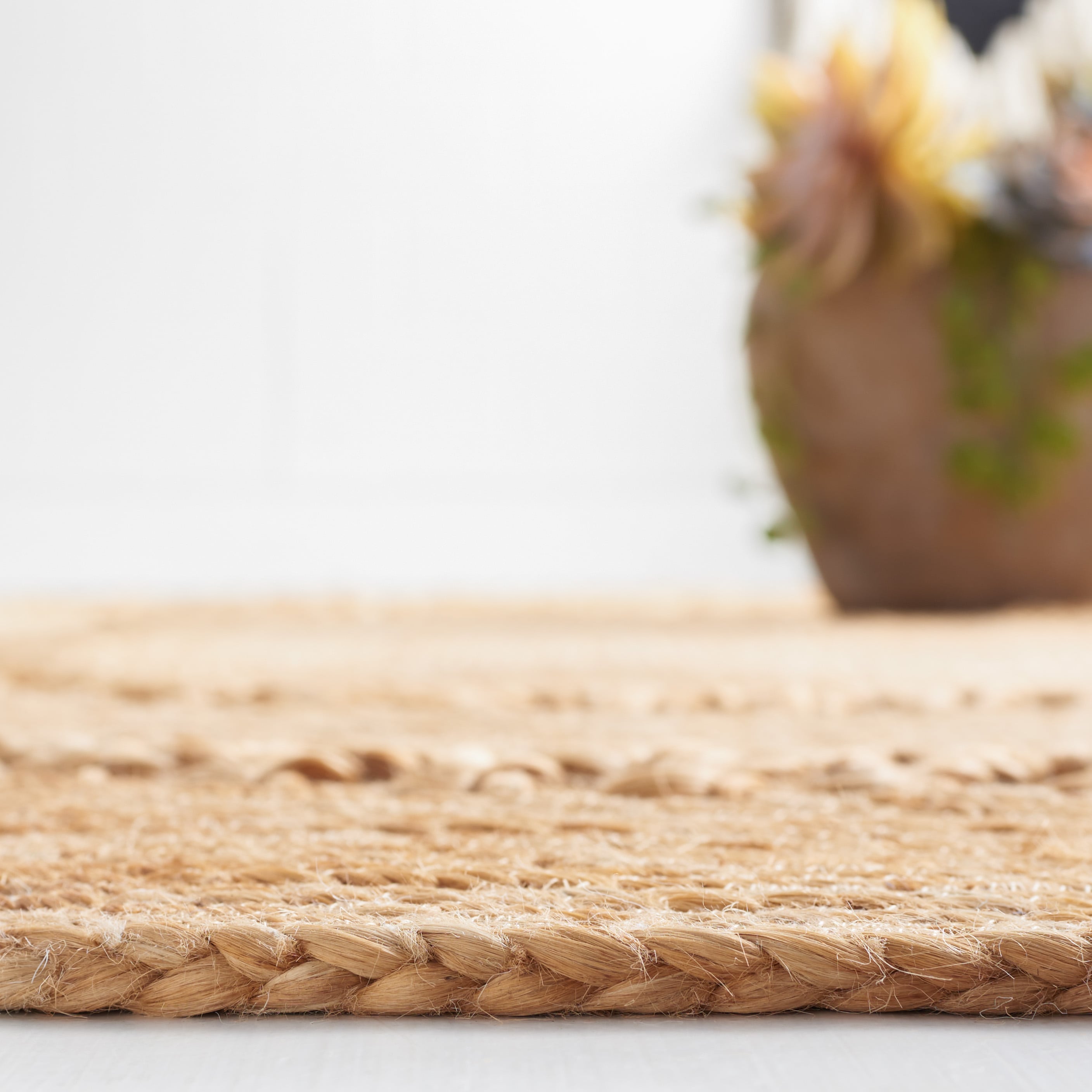 Natural Handwoven Jute Round Rug with Open Weave Design