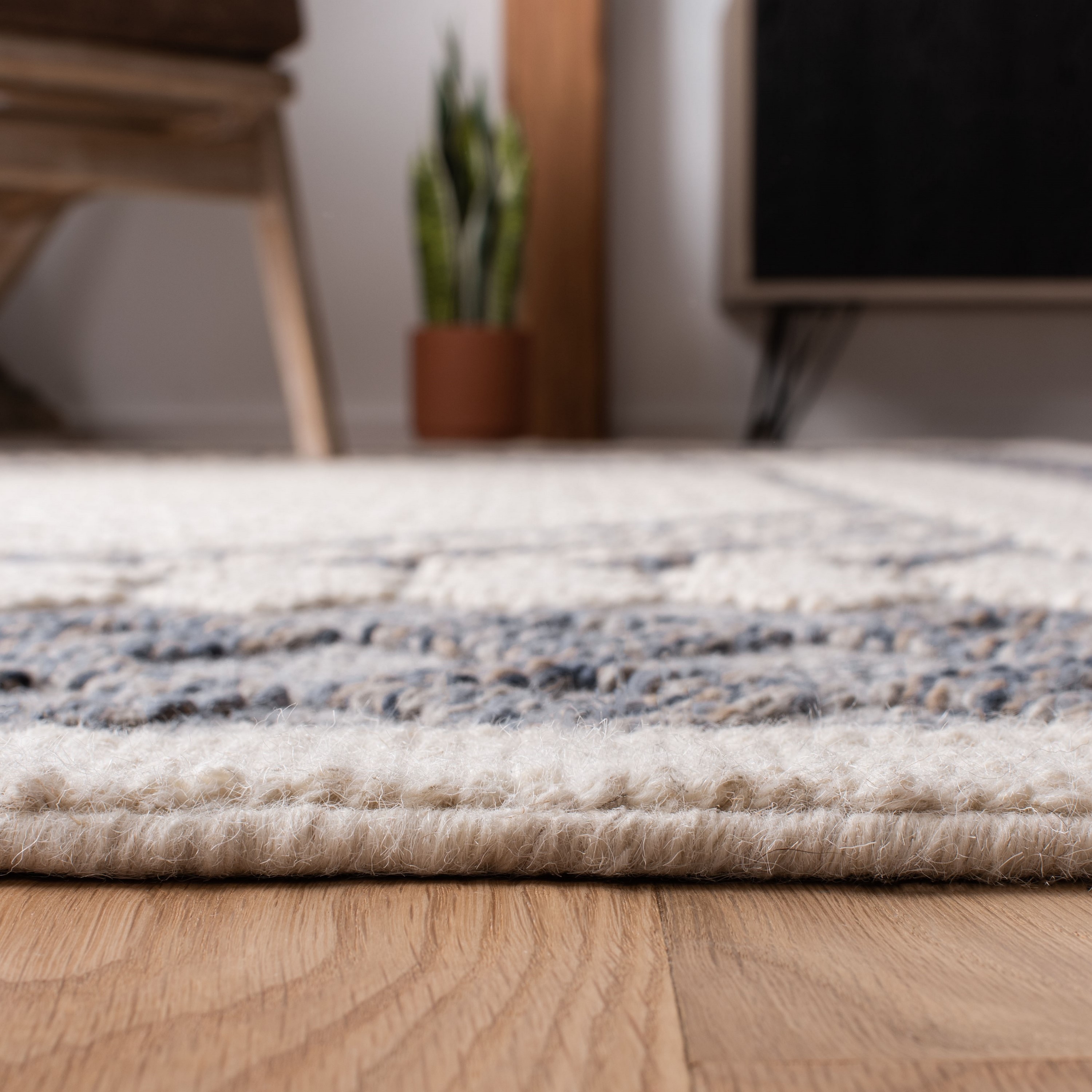 Natura 9' x 12' Blue and Cream Wool Handwoven Area Rug