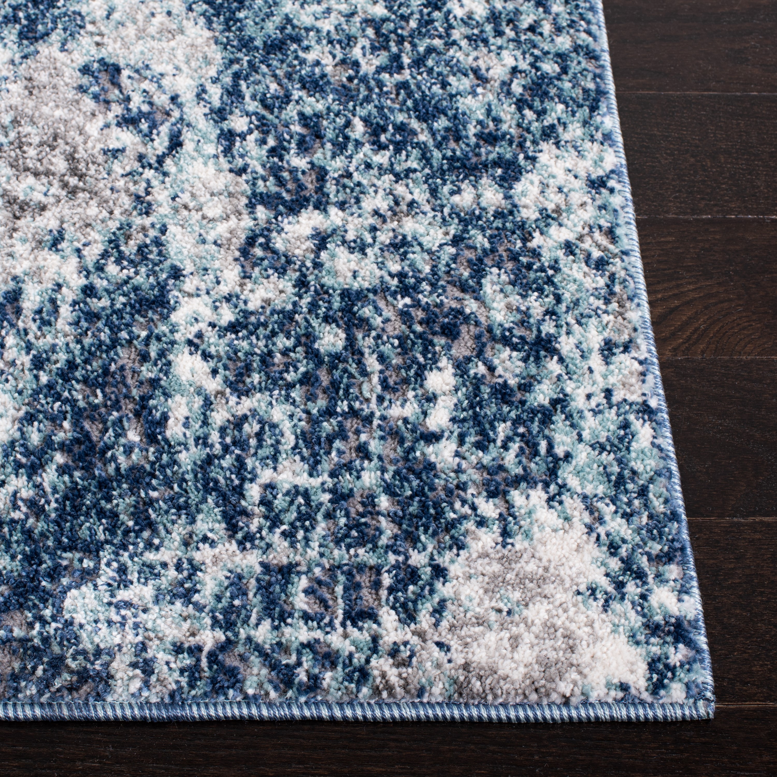 Navy and Grey Abstract Synthetic 4' x 6' Area Rug