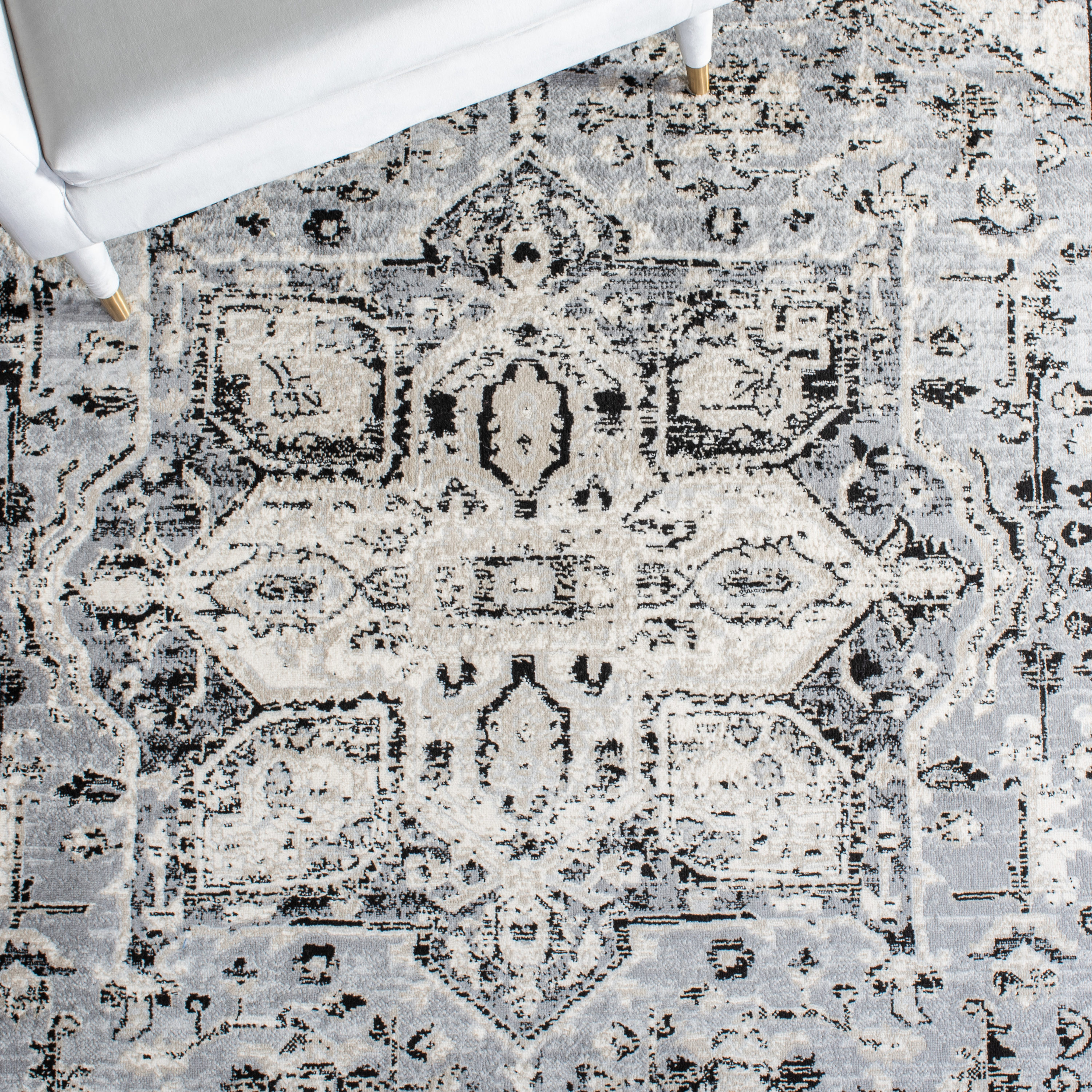 Elegant Heirloom 9' x 12' Grey and Black Synthetic Area Rug
