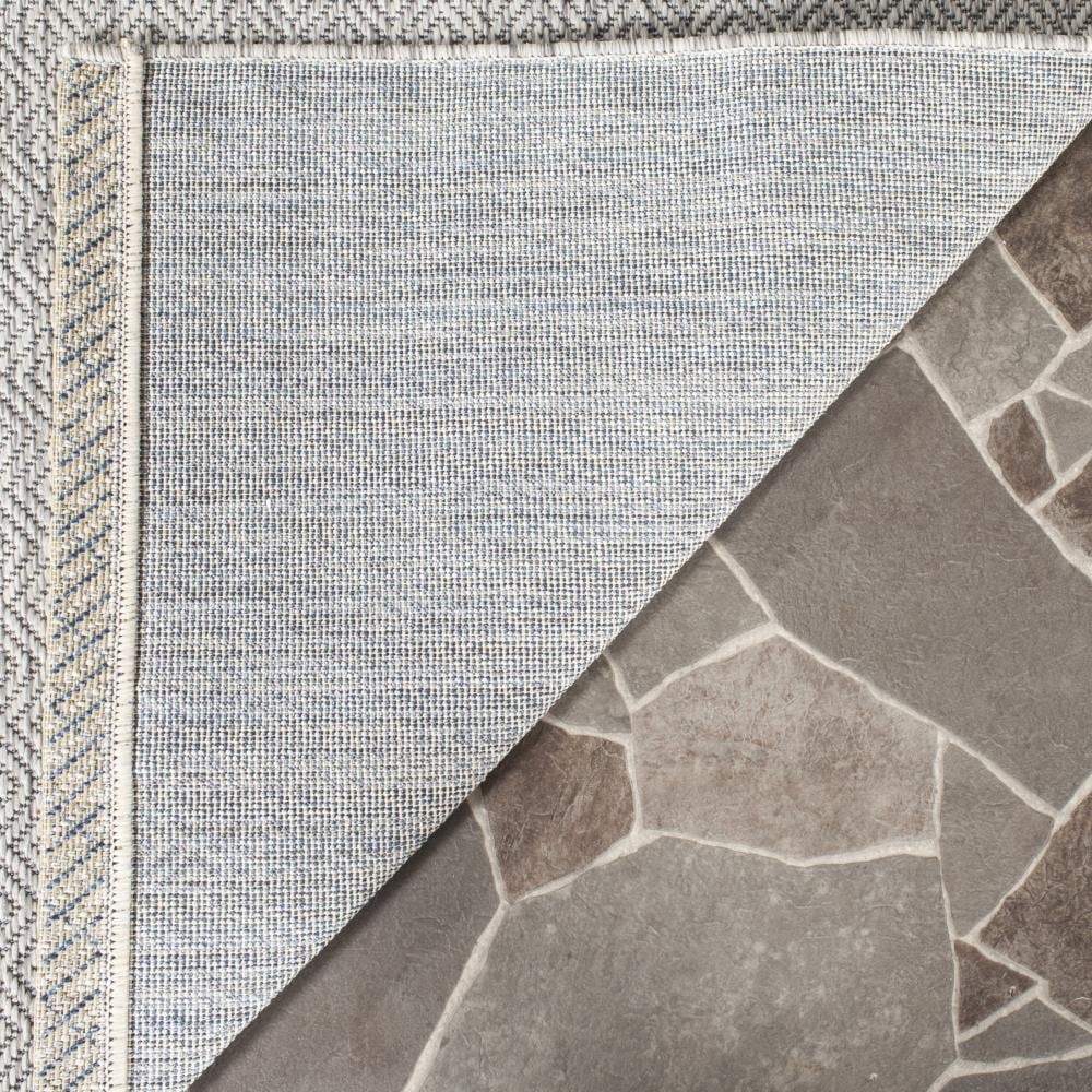 Delano Monochrome Gray Synthetic 6'7" x 9'6" Indoor/Outdoor Rug