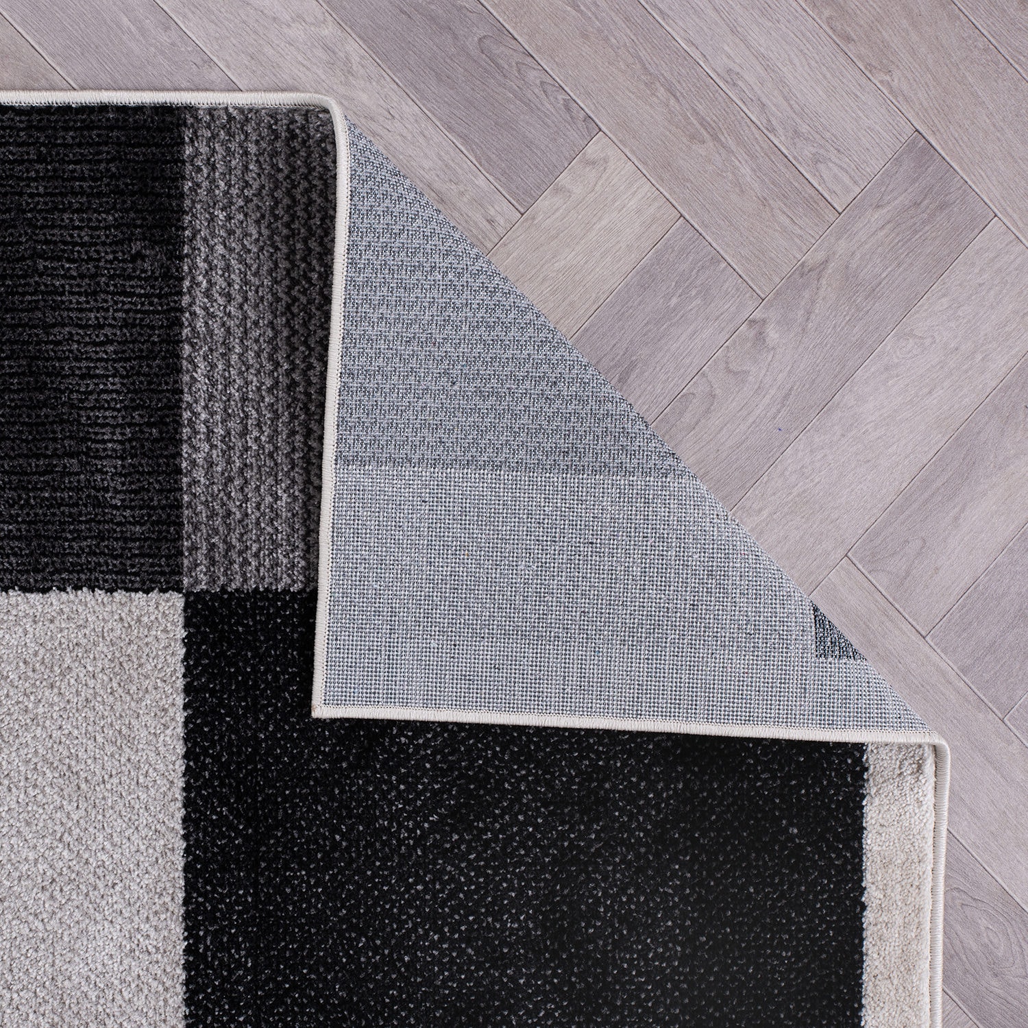 Modern Geometric Black and Gray Synthetic Rectangular Area Rug, 5' x 7'