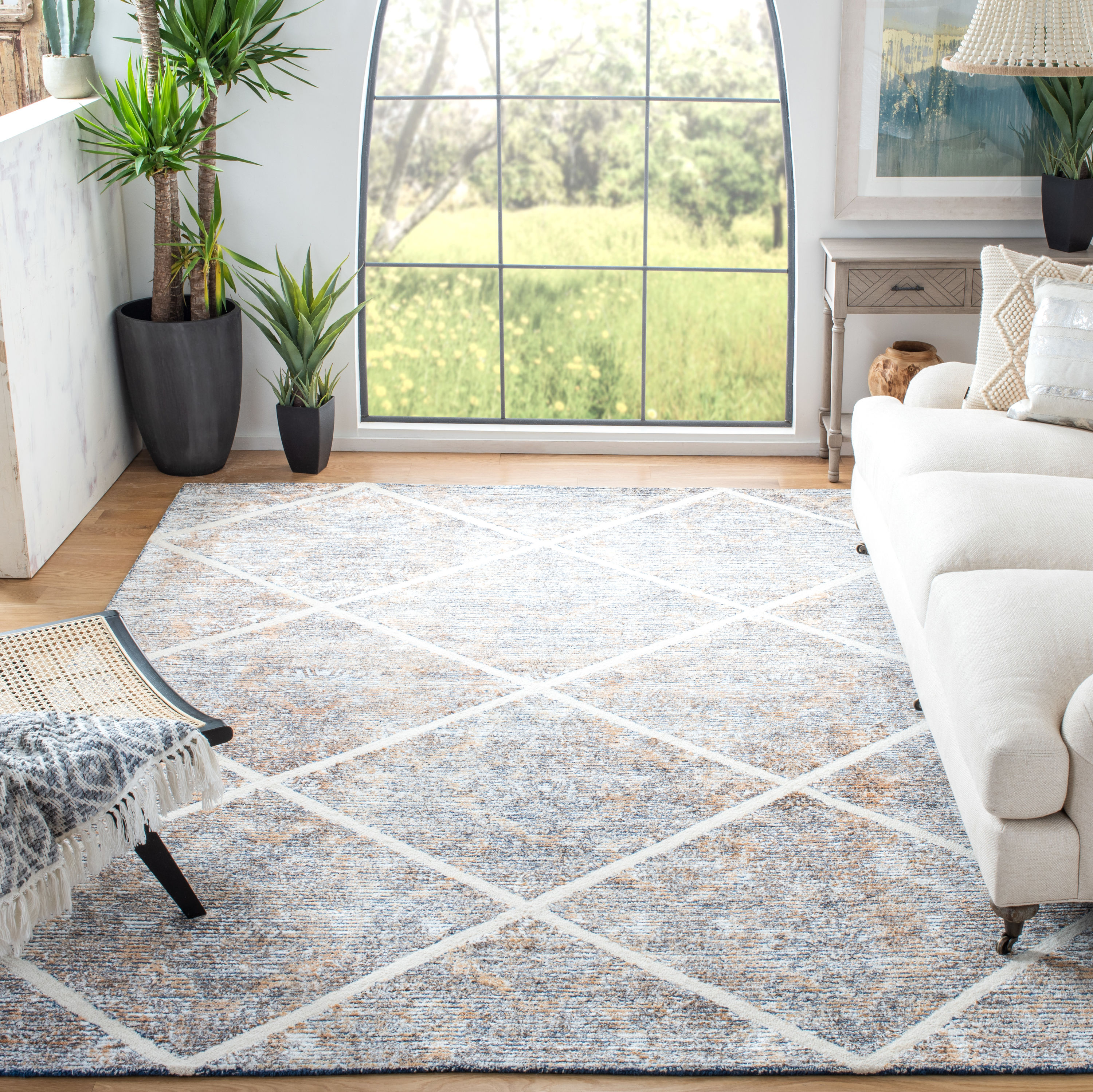 Ivory and Gold Hand-Tufted Wool and Viscose 5' x 8' Area Rug