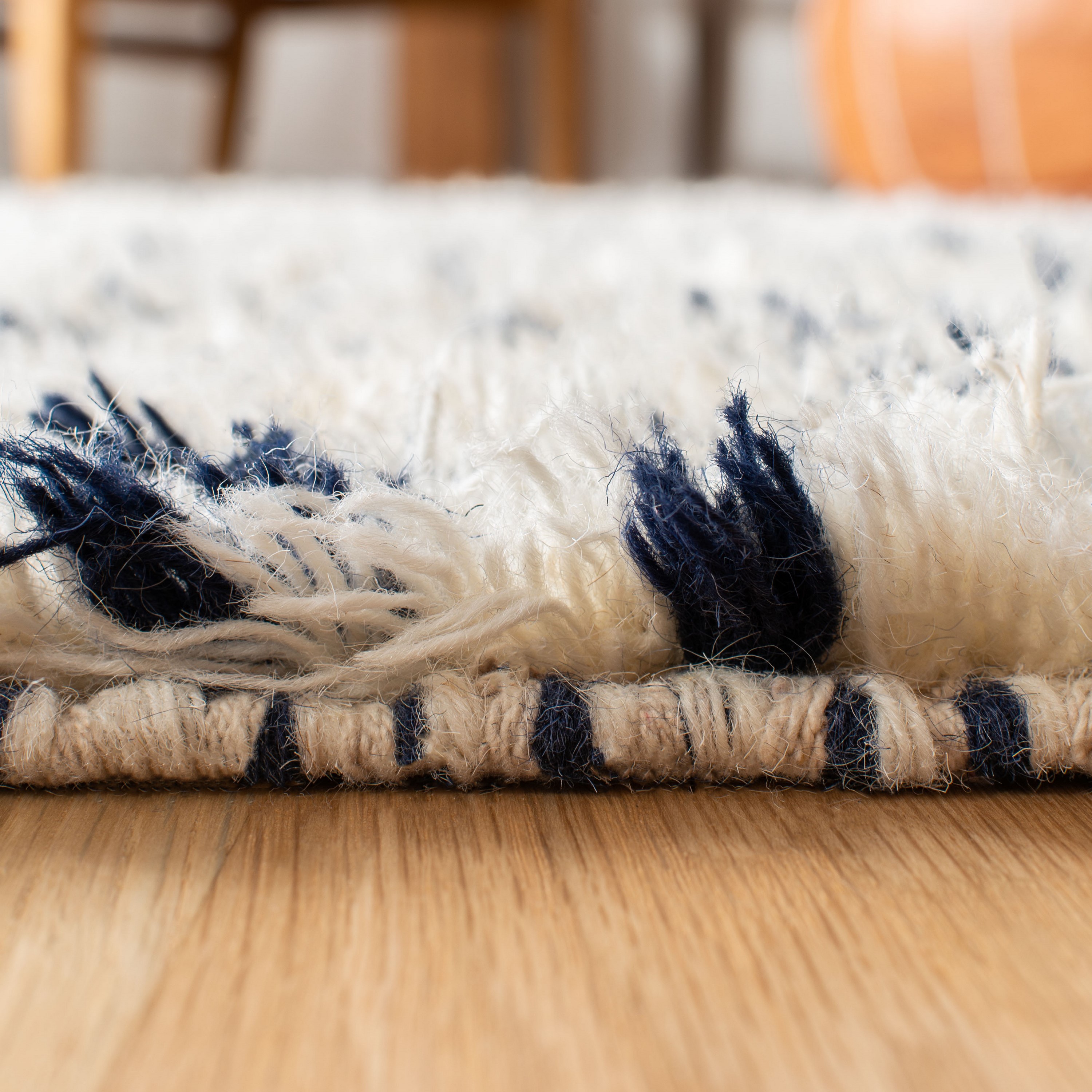 Ivory and Navy Geometric Wool Shag 8' x 10' Area Rug