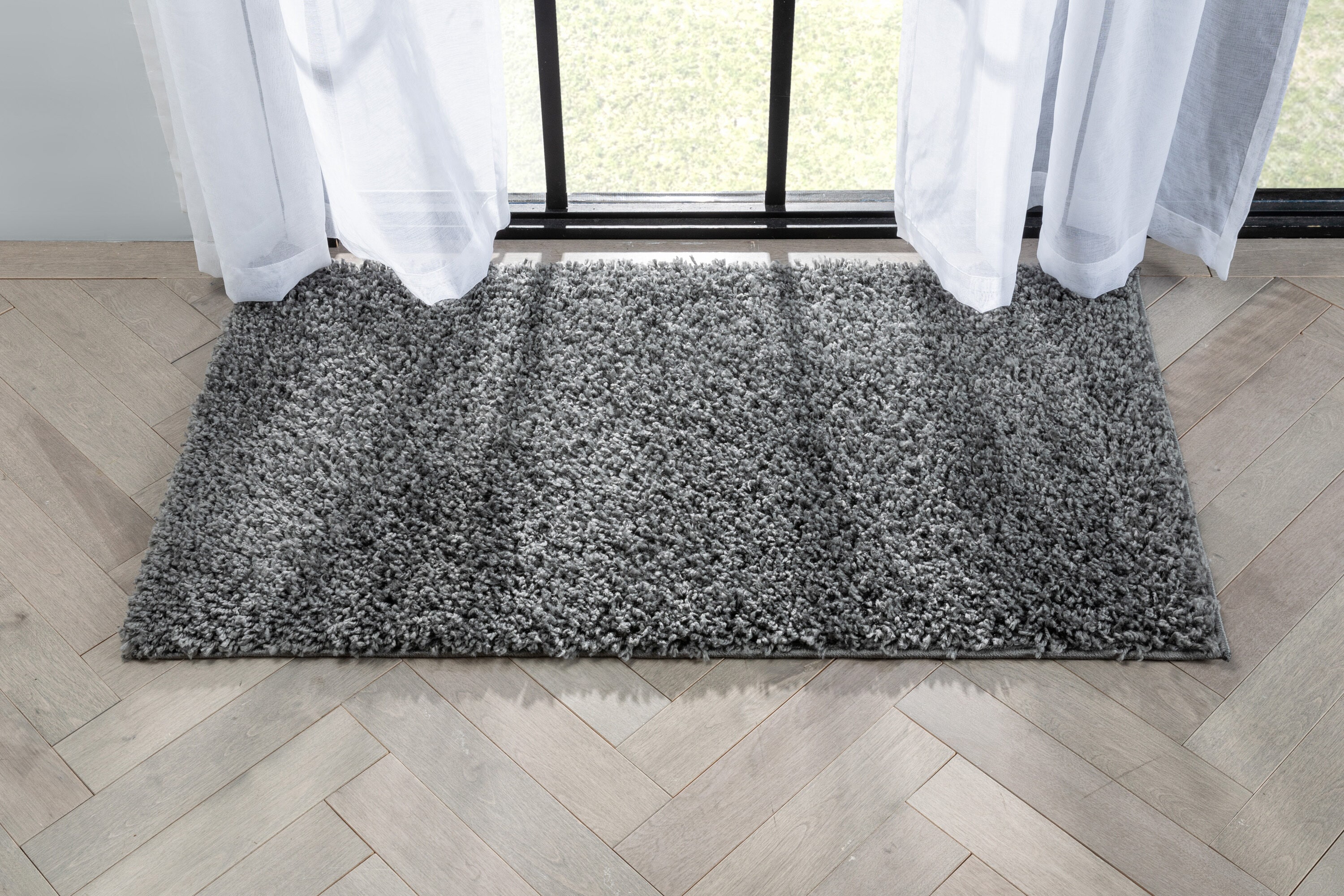 Well Woven ELL-23-3 2 x 4 (ft) Loomed Polypropylene Dark Grey Rectangular Indoor Solid Mid-Century Modern Area rug