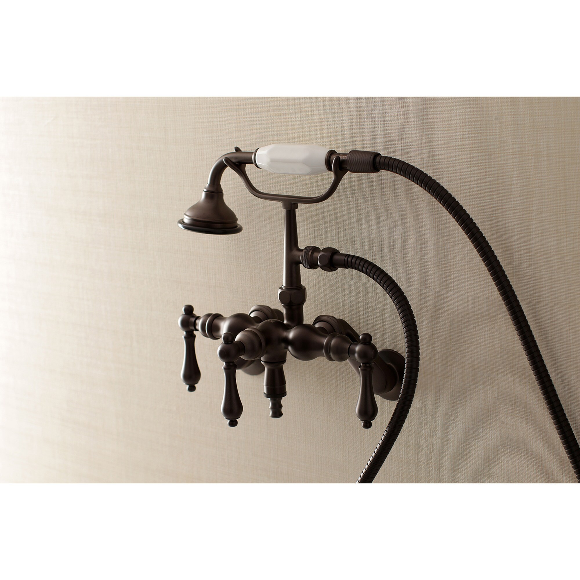 Kingston Brass WLAE419T5 Vintage Oil-rubbed bronze 3-handle Wall-mount Low-arc Bathtub Faucet with Hand Shower ( Valve Included )
