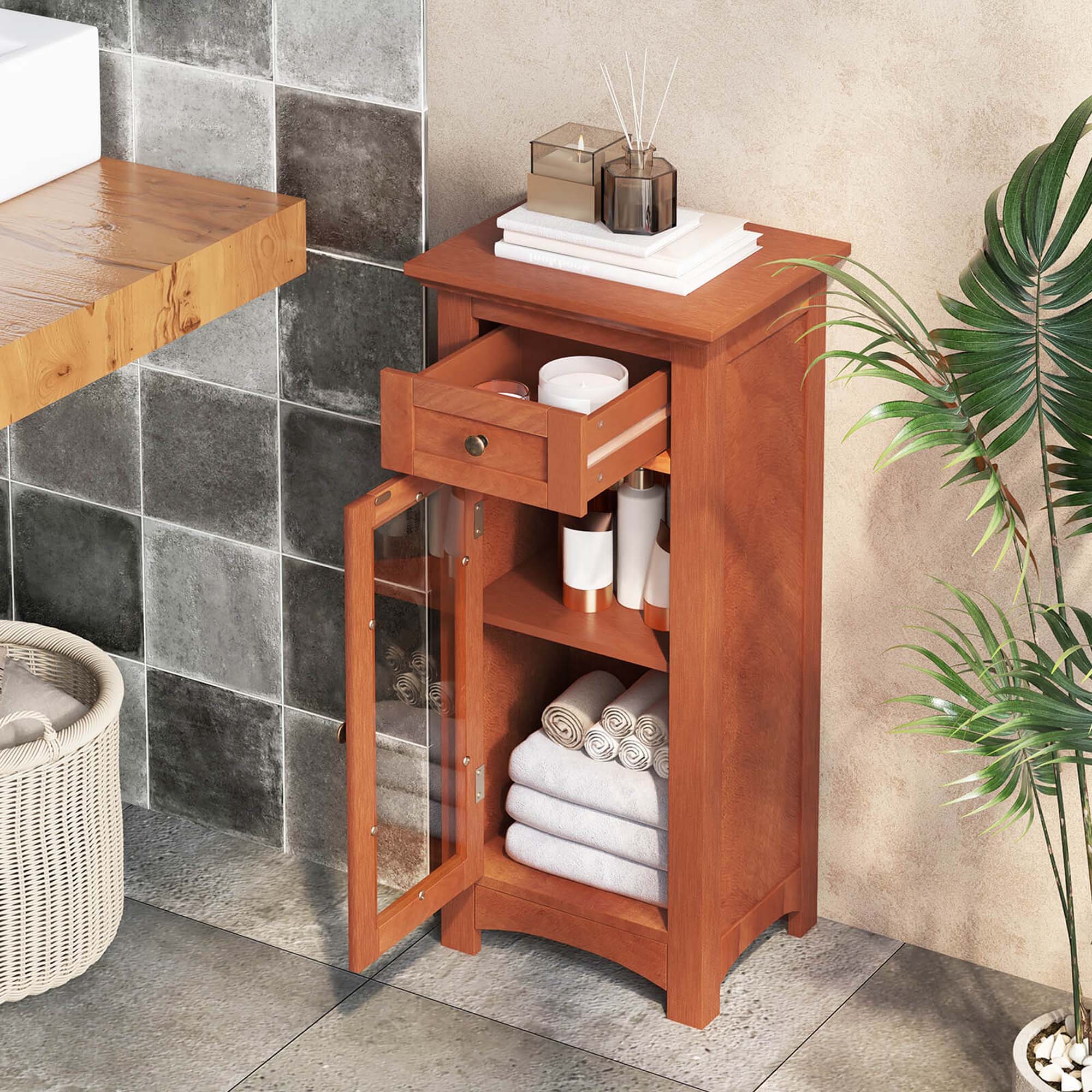 Wooden cabinet styled with towels and bathroom decor.