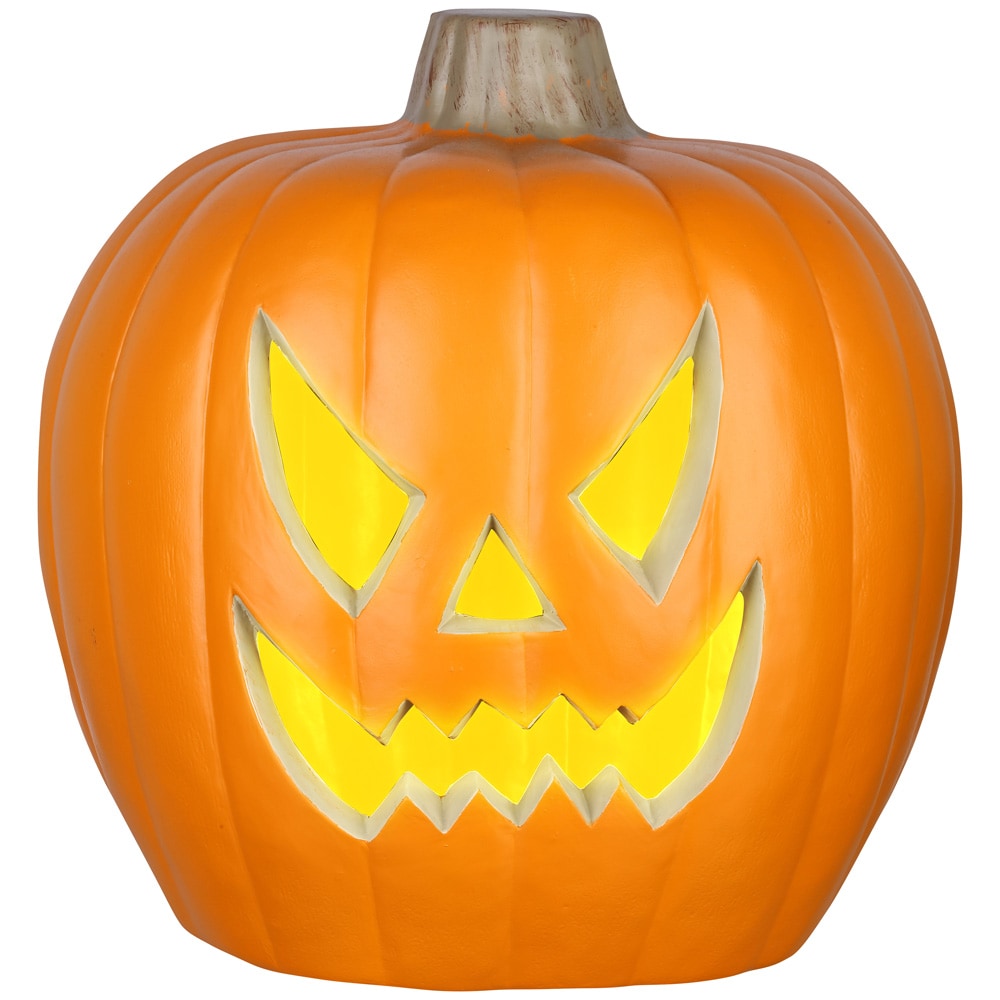 Carved Pumpkins, Smiling, on a Table Out of Doors Facing and Side