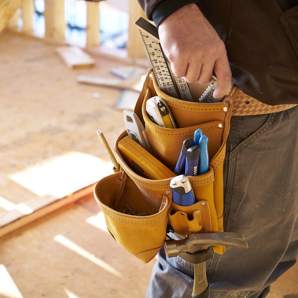 Construction tool outlet pouch