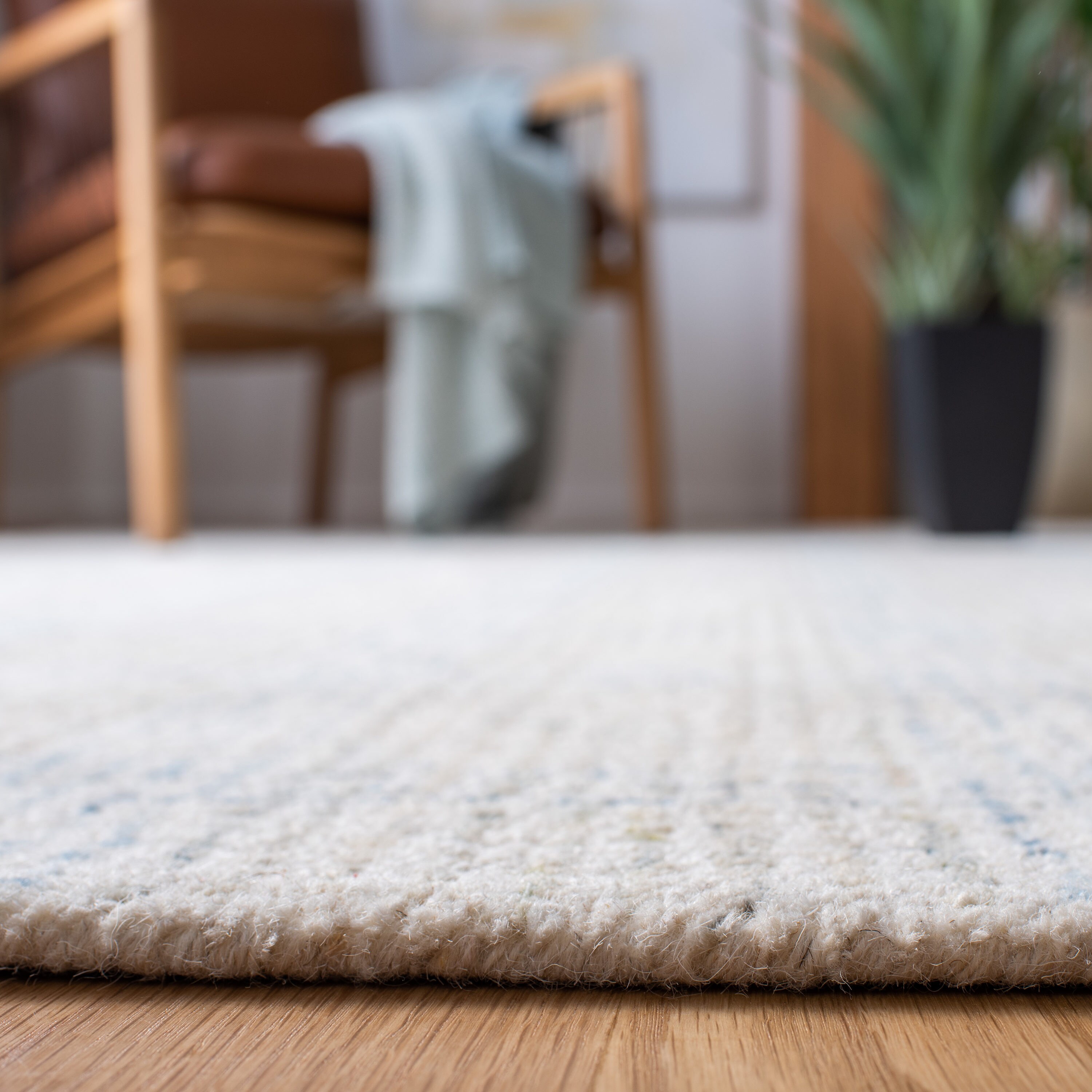 Ivory and Beige Handmade Wool Abstract Area Rug 5' x 8'