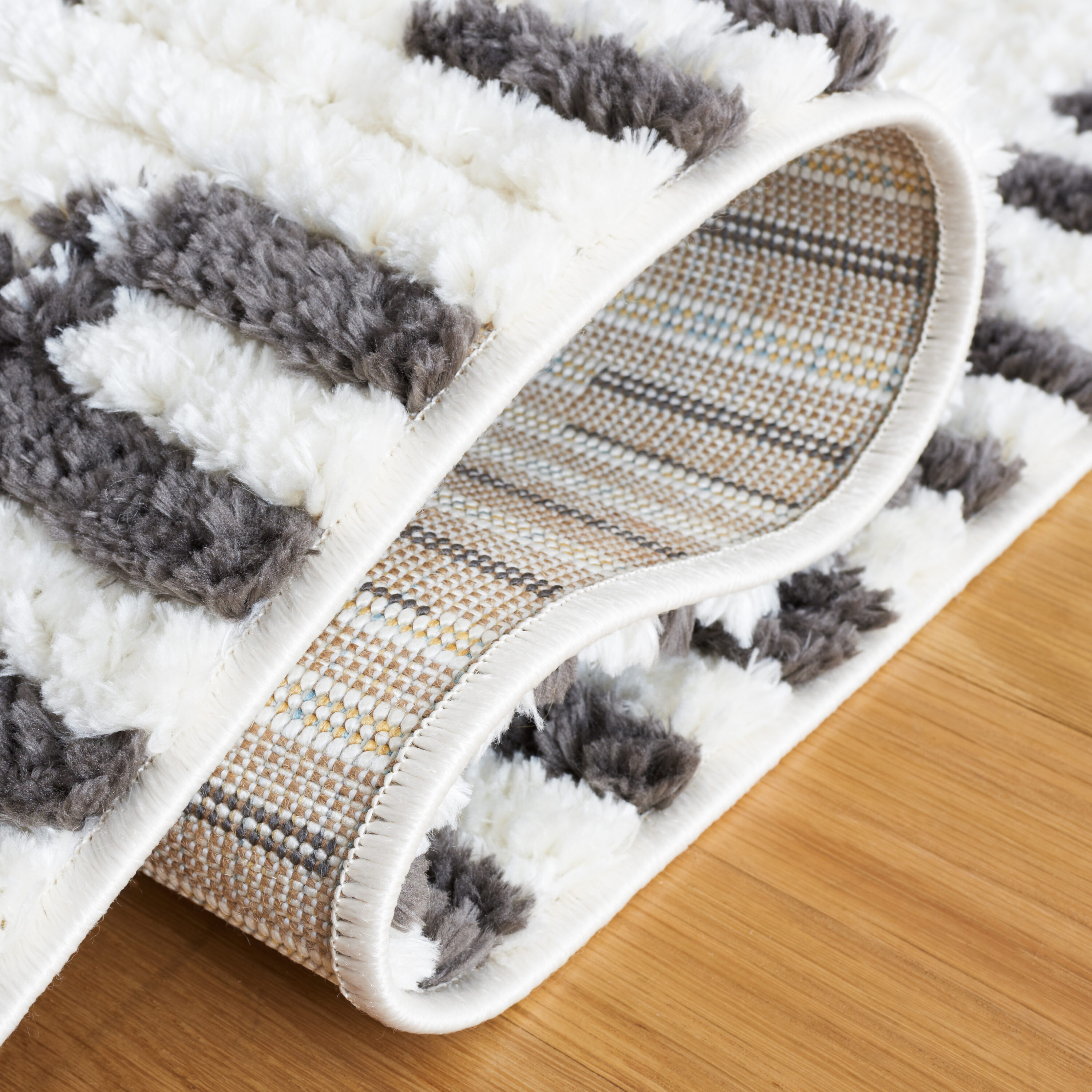 Ivory and Dark Grey Synthetic 9' x 12' Reversible Area Rug