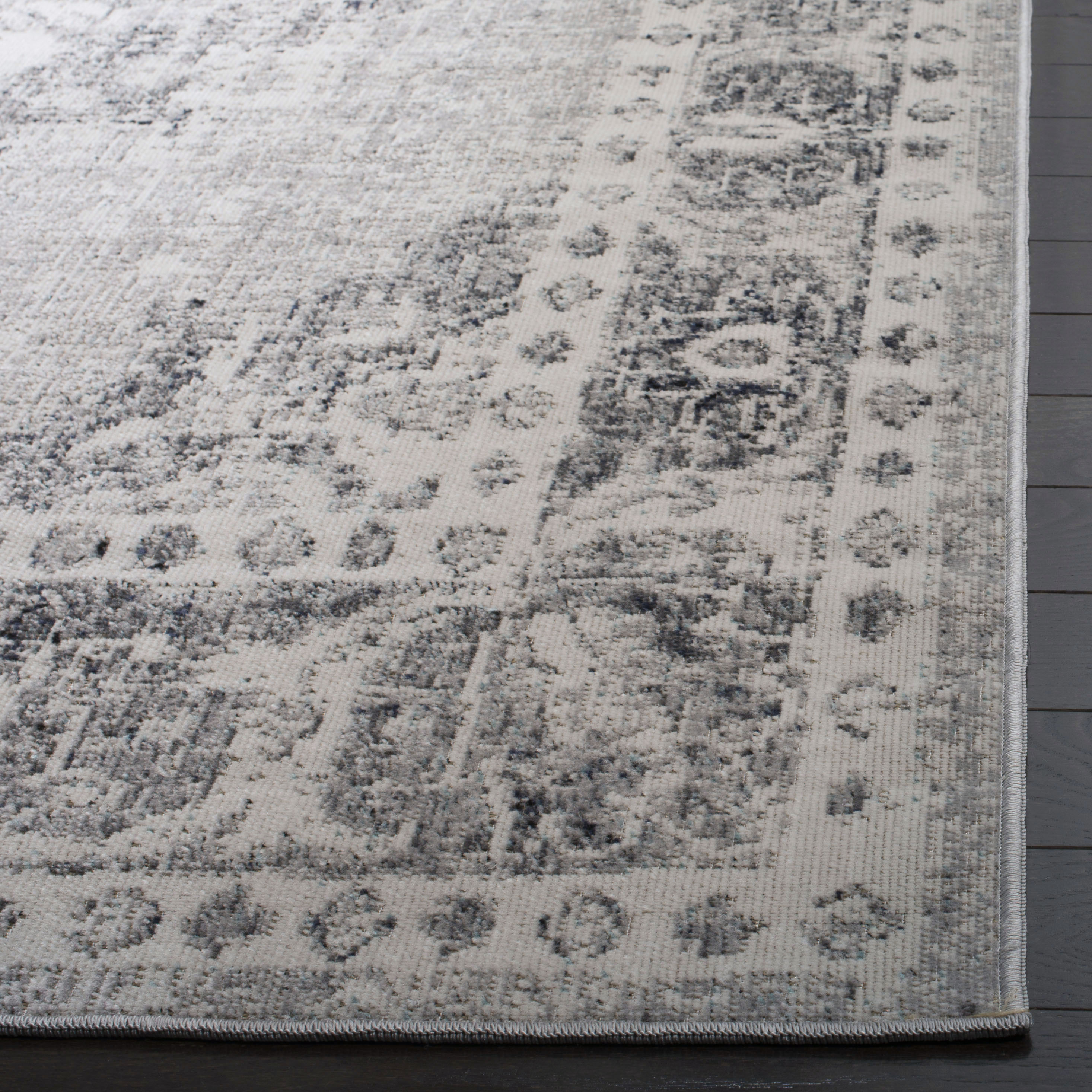 Grey and Ivory Medallion Synthetic 4' x 6' Area Rug