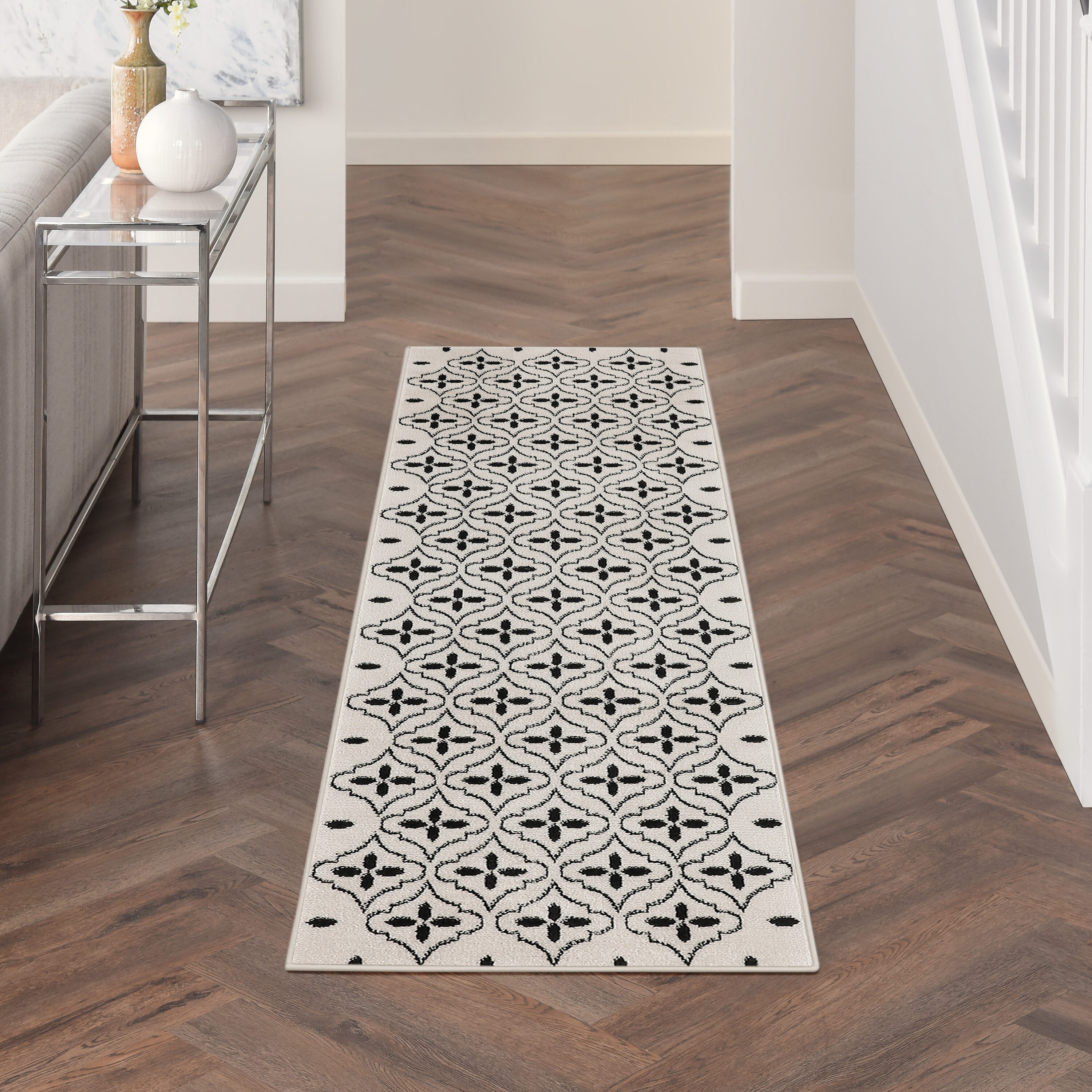 Nourison Home 099446940629 Essentials 2 x 8 (ft) Loomed Polypropylene Ivory Black Rectangular Indoor/Outdoor Trellis Runner rug