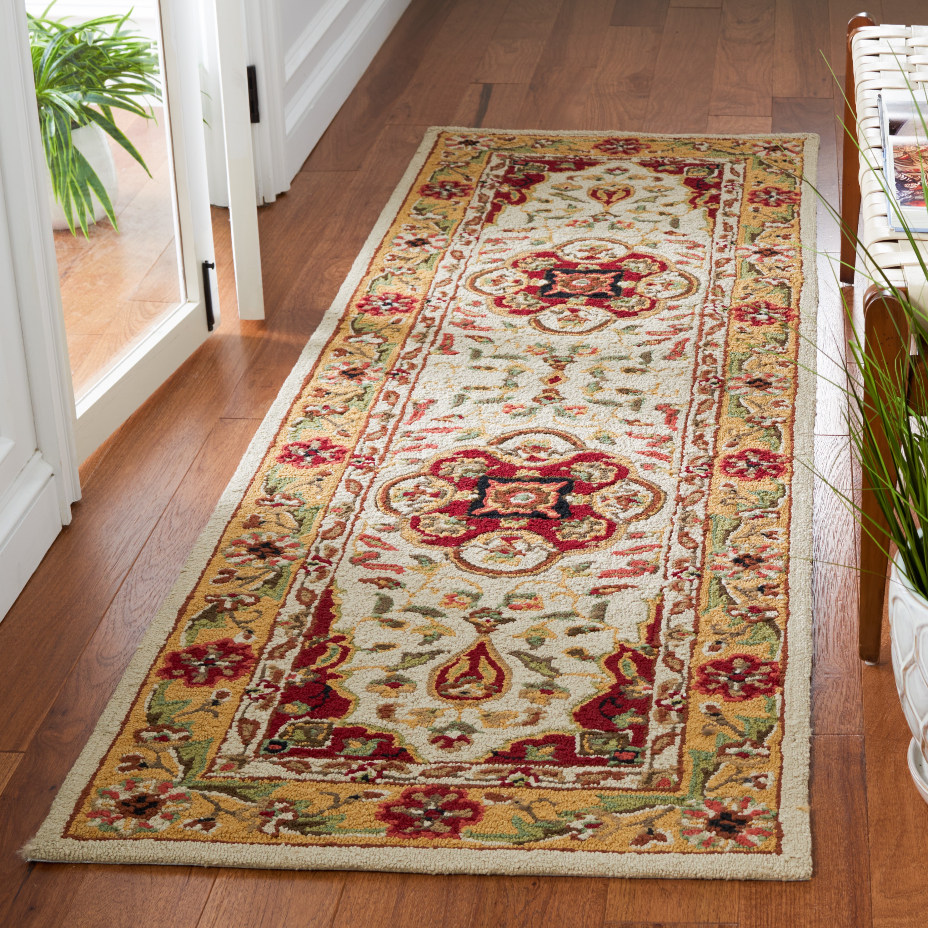 Hand Hooked Cream and Red Synthetic Runner Rug - 2'6" x 10'