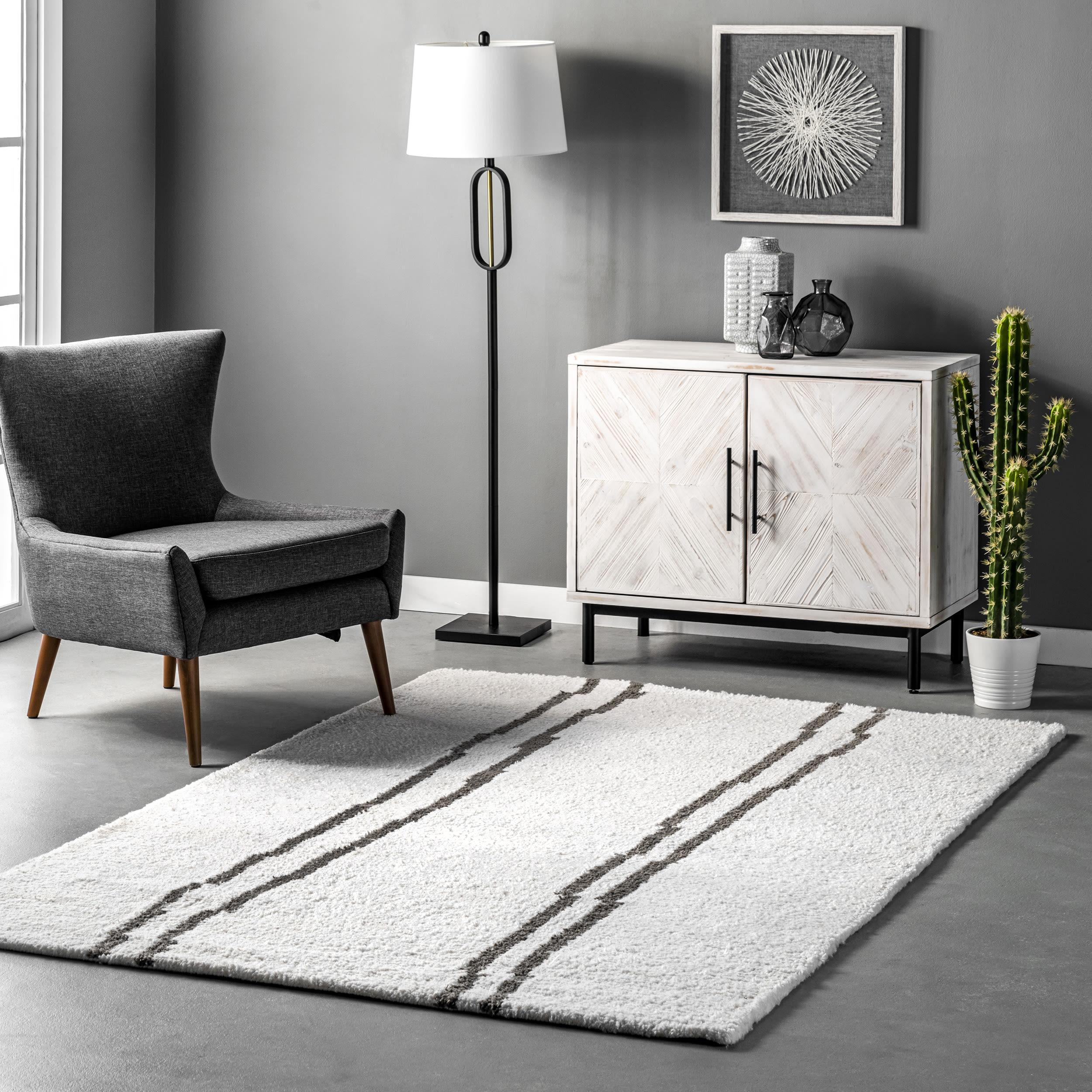nuLOOM MTMI01A-508 Isis 5 x 8 (ft) Tufted Polyester Ivory Rectangular Indoor Stripe Vacuum regularly Area rug