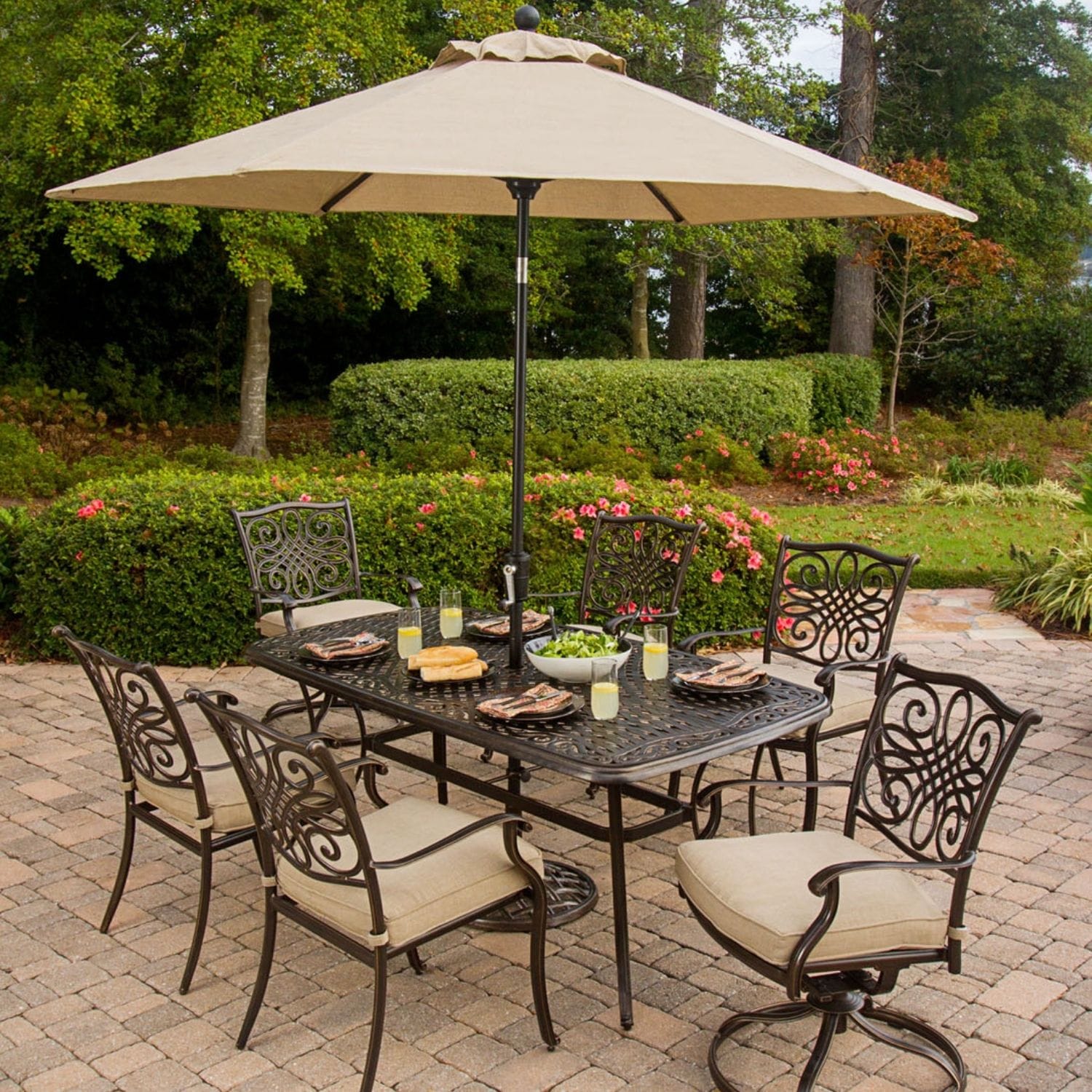 Hanover TRADITIONS7PCSW-SU Traditions 8 -Piece Bronze Patio Dining Set Aluminum Rectangle Table with 6 Tan Cushions Stationary and Motion Chairs and Umbrella Included