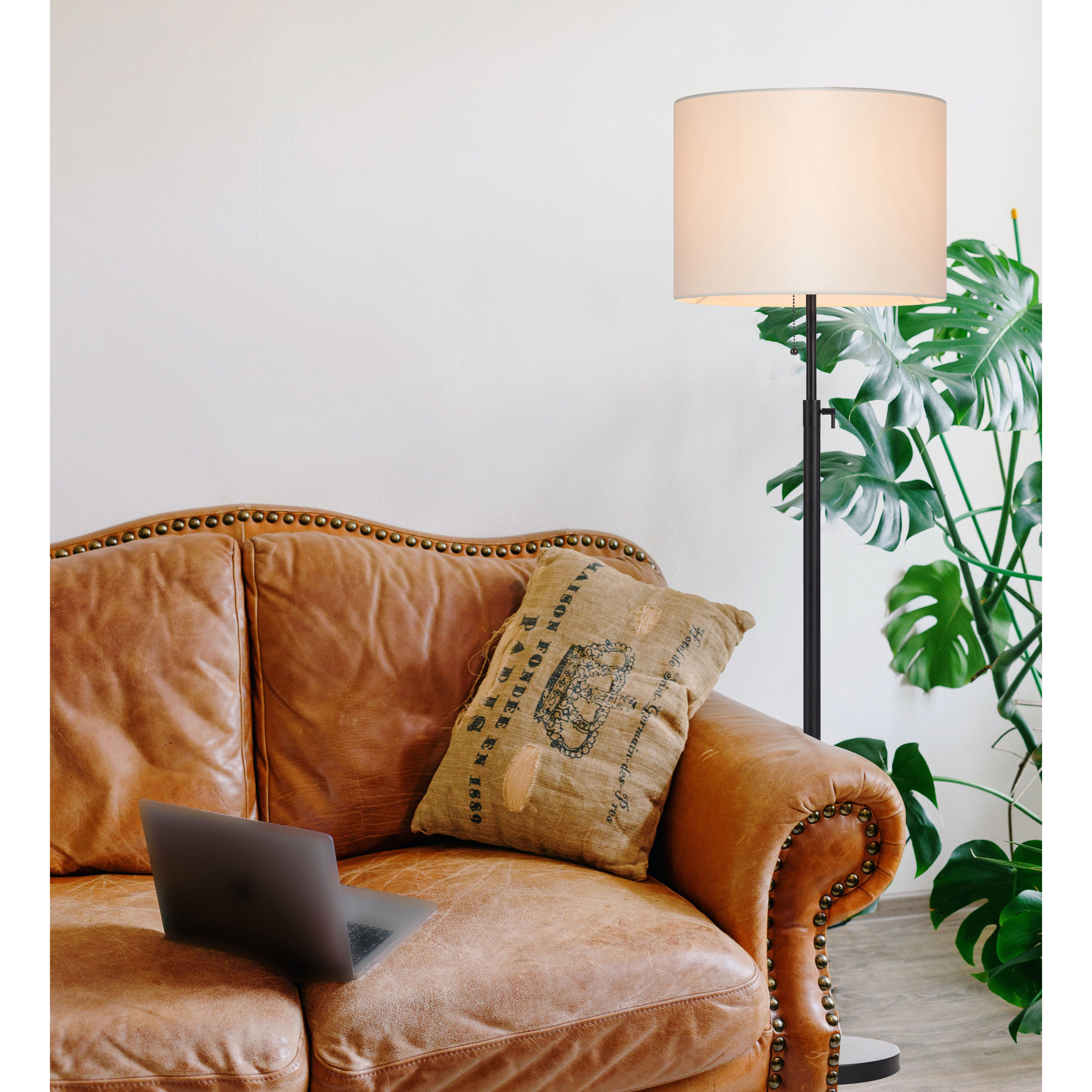 Adjustable Black Metal Floor Lamp with Beige Drum Shade