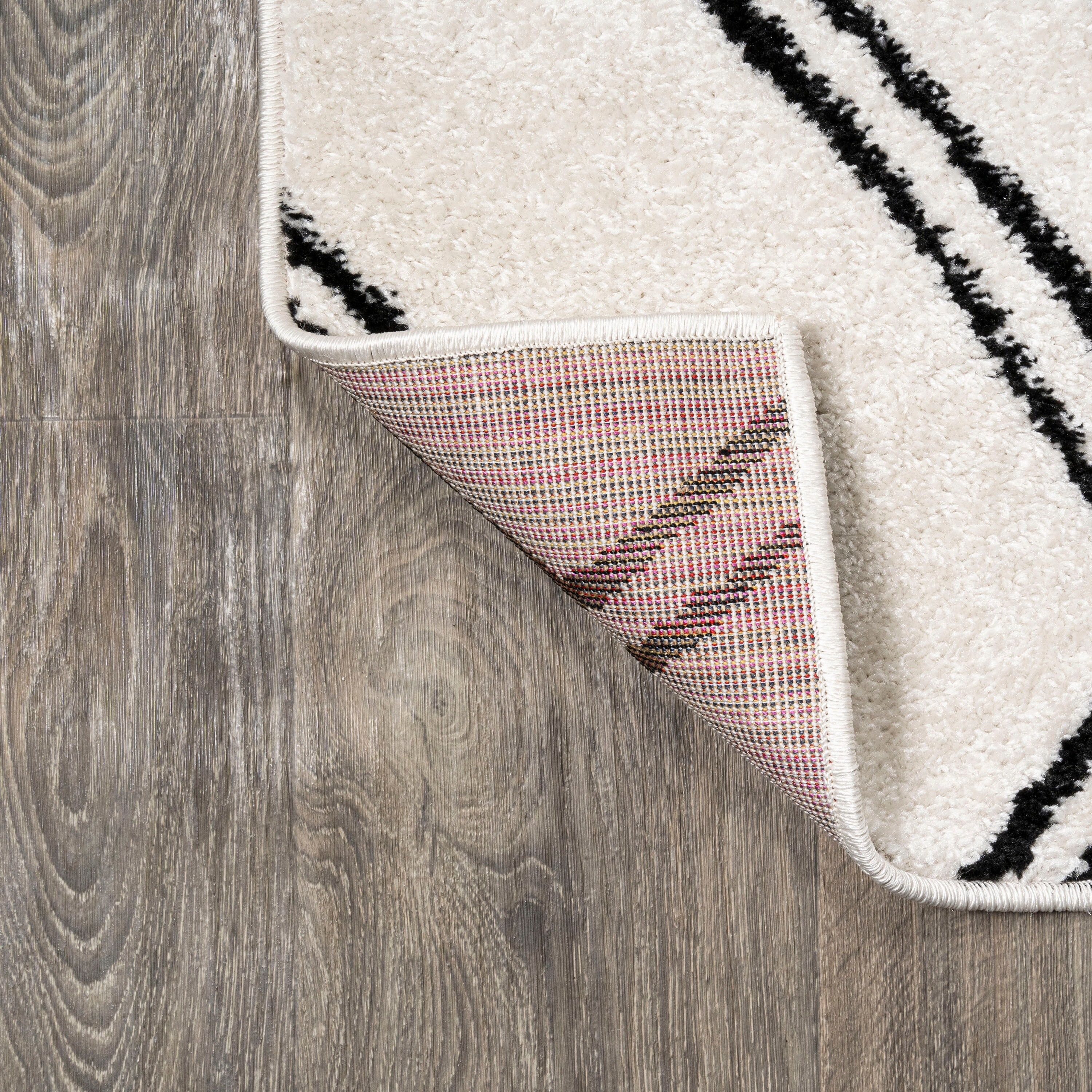 Deia Black and White Geometric Shag Area Rug