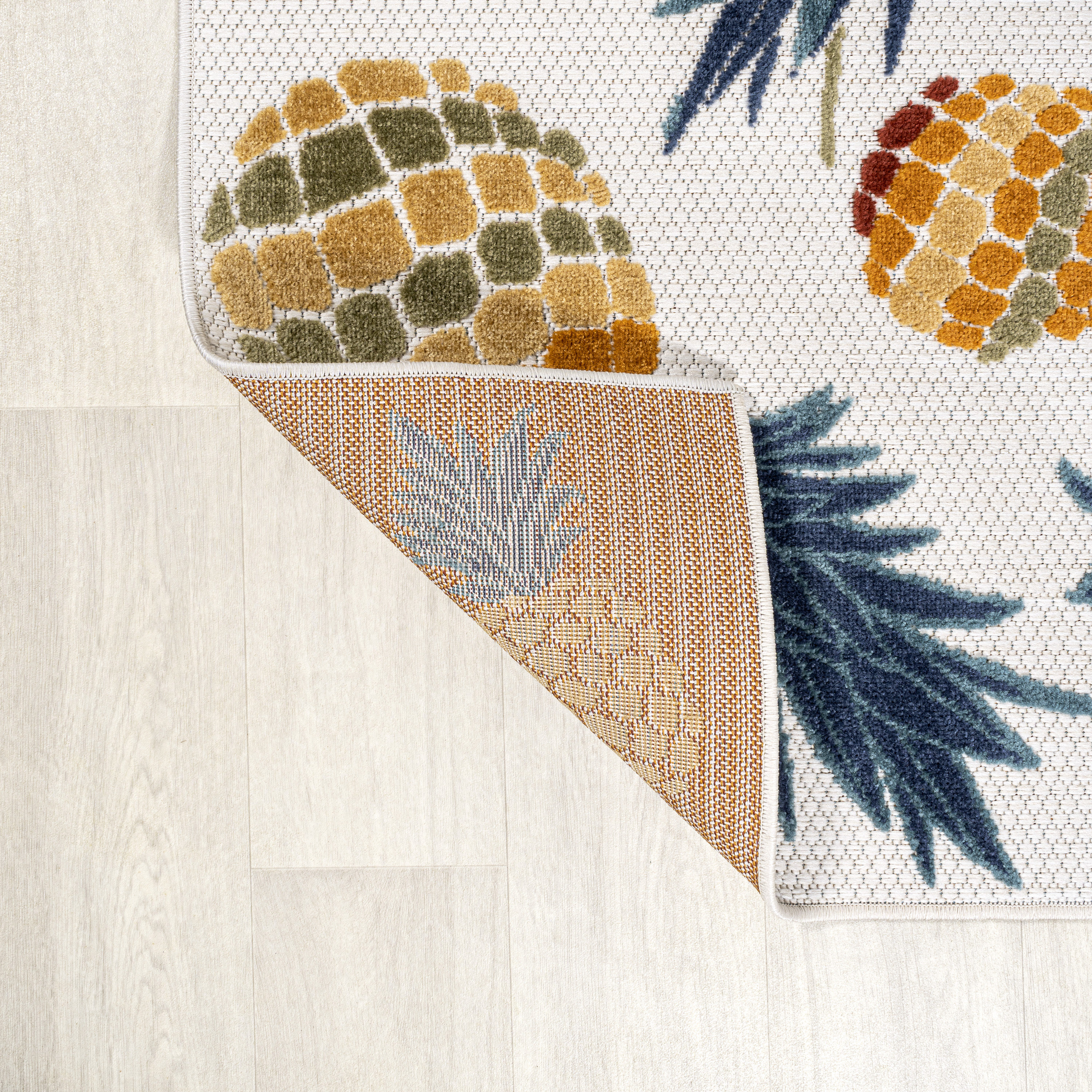 4' x 6' Ivory and Orange Floral Synthetic Area Rug
