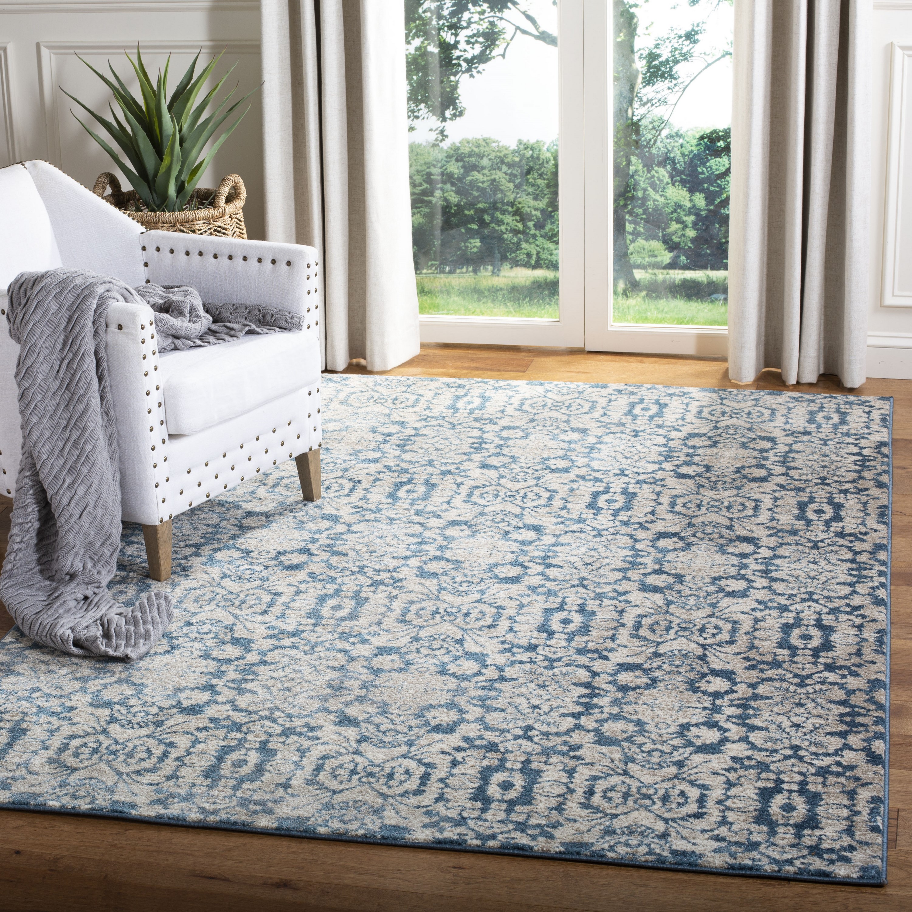 Blue Floral Motif Synthetic 8' x 10' Area Rug