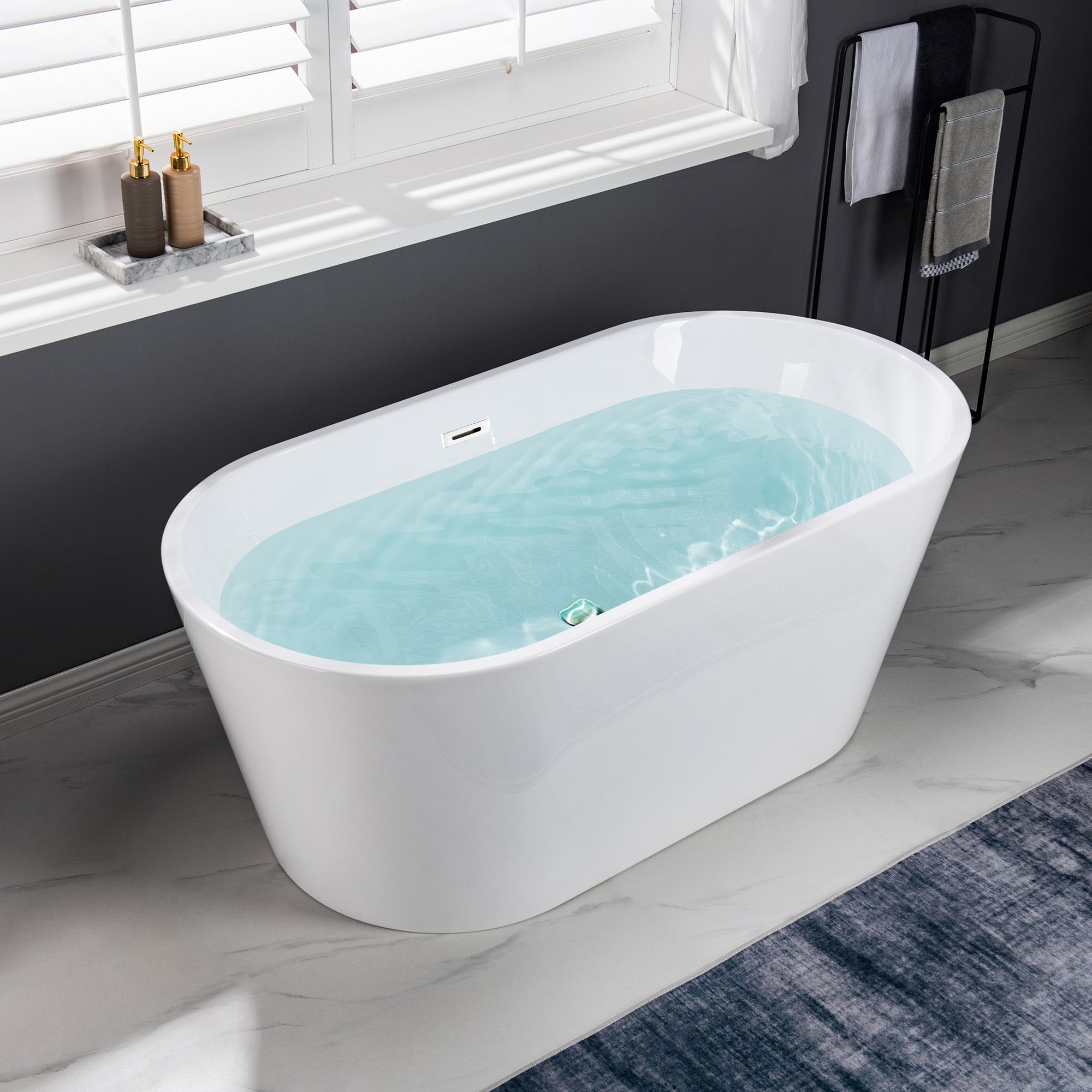 Woodbridge Reims 29.5-in x 59-in White with Polished Chrome Trim Acrylic  Oval Freestanding Soaking Bathtub with Drain (Center Drain) in the Bathtubs  department at