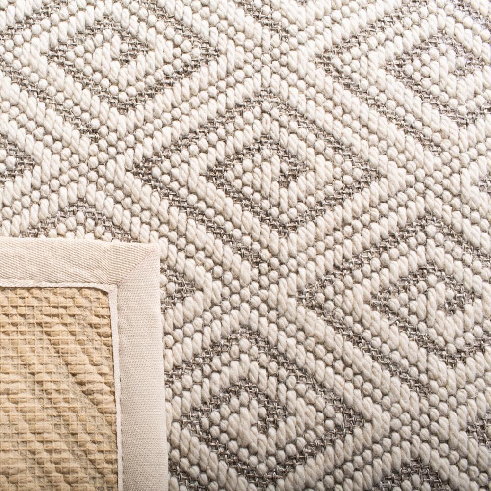 Ivory Geometric Hand-Knotted Wool and Synthetic Rug, 5'x8'