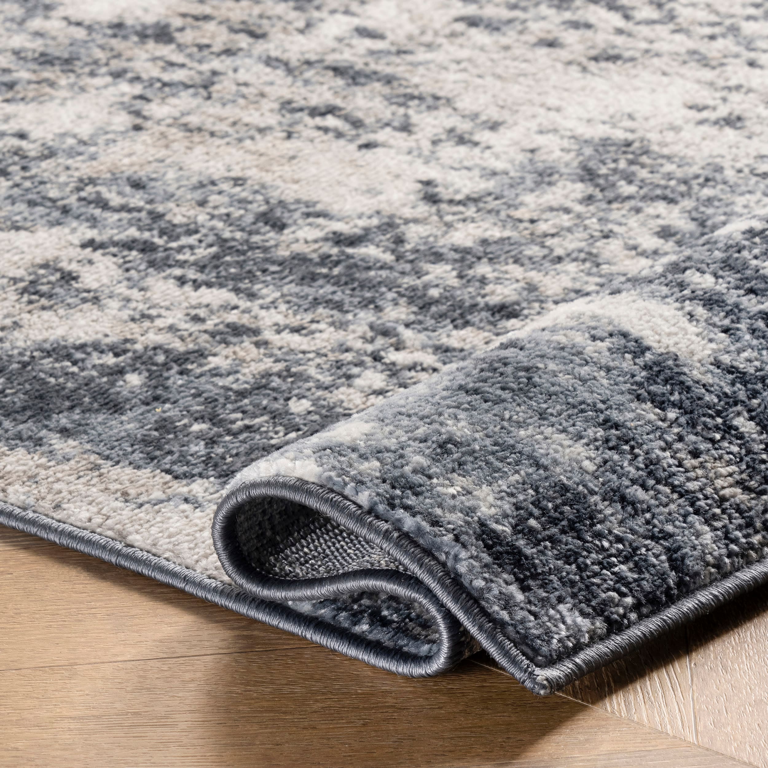 Reversible Abstract Blue Synthetic 4' x 6' Easy-Care Area Rug