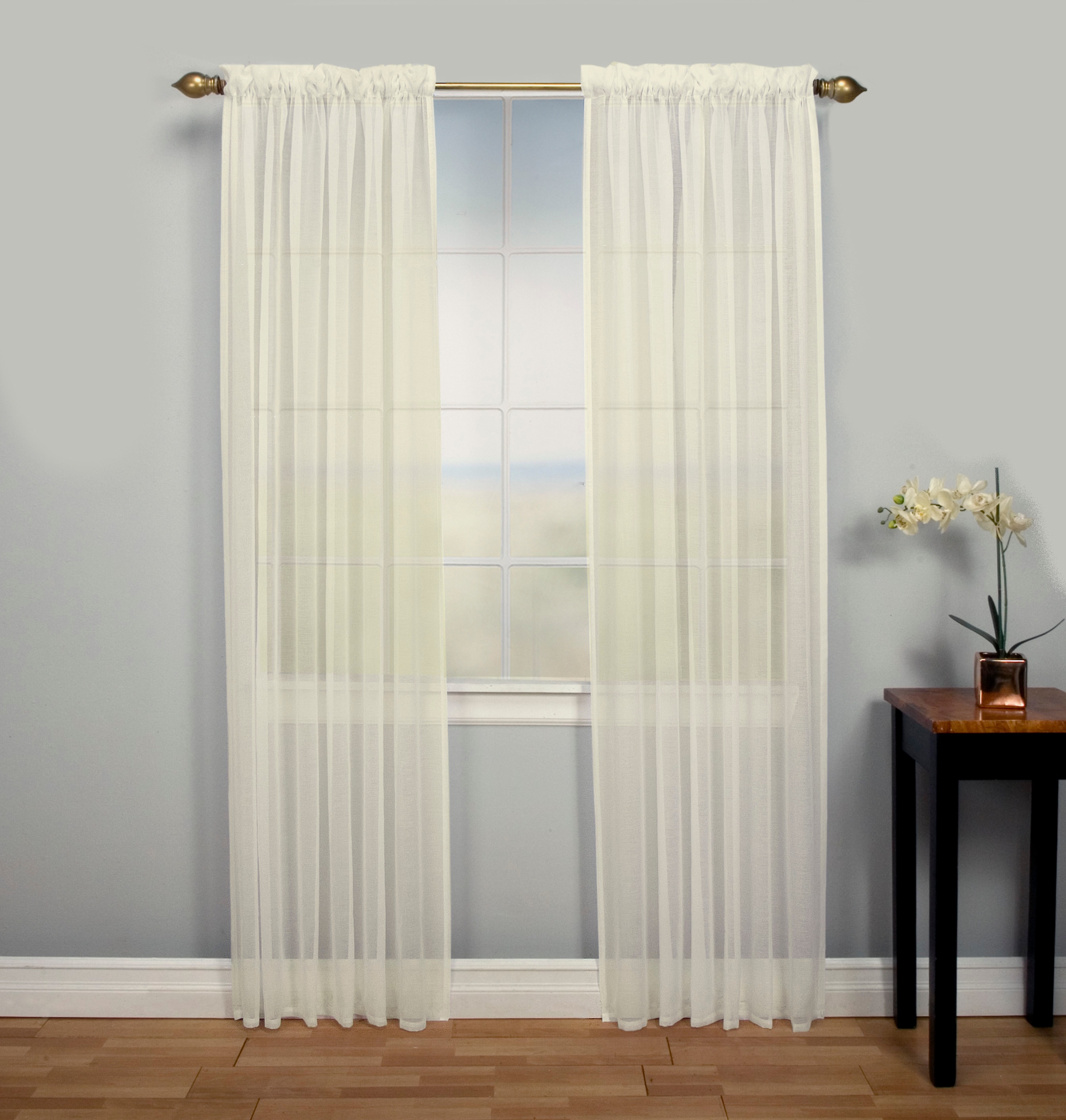 Style Selections 84-in Snow Semi-sheer Rod Pocket Single Curtain Panel in  the Curtains & Drapes department at