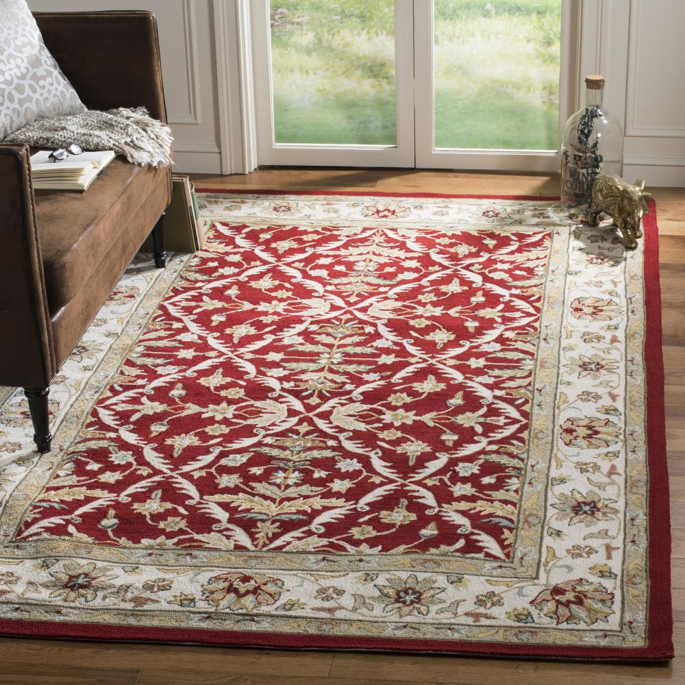 Red and Ivory Hand-Hooked Synthetic 6' x 9' Area Rug