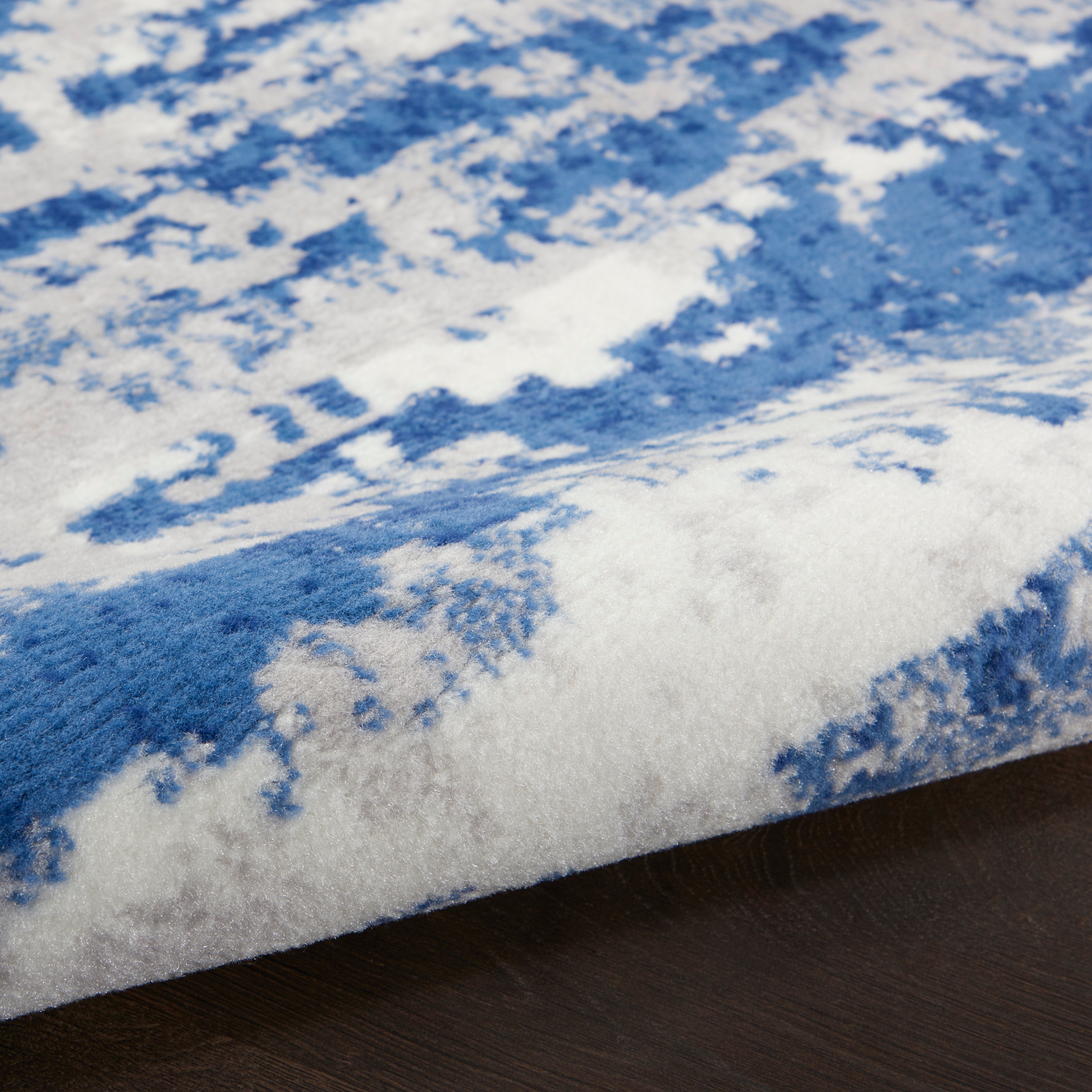 Ivory and Navy Abstract Synthetic Runner Rug