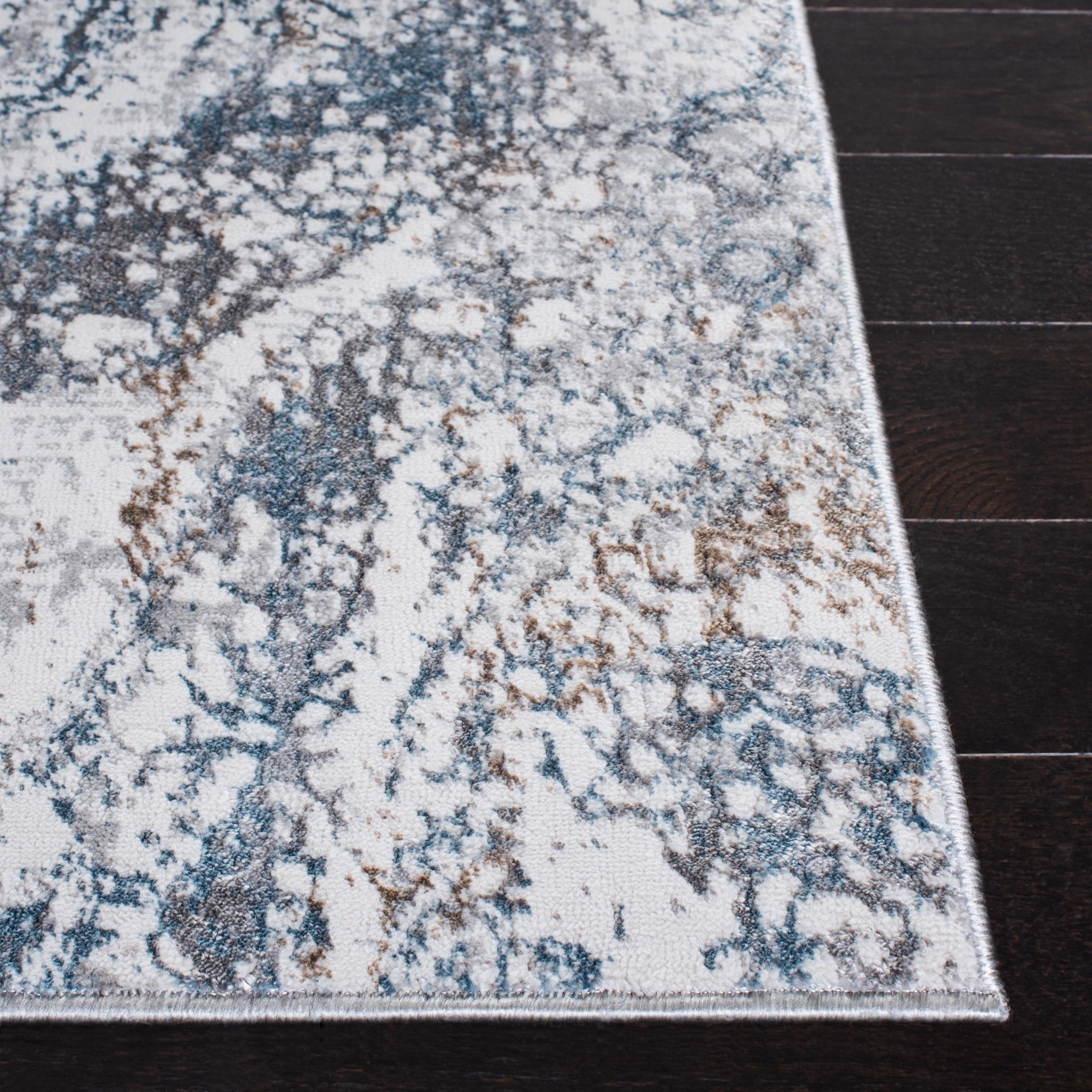 Ivory Abstract 9' x 12' Synthetic Easy Care Area Rug