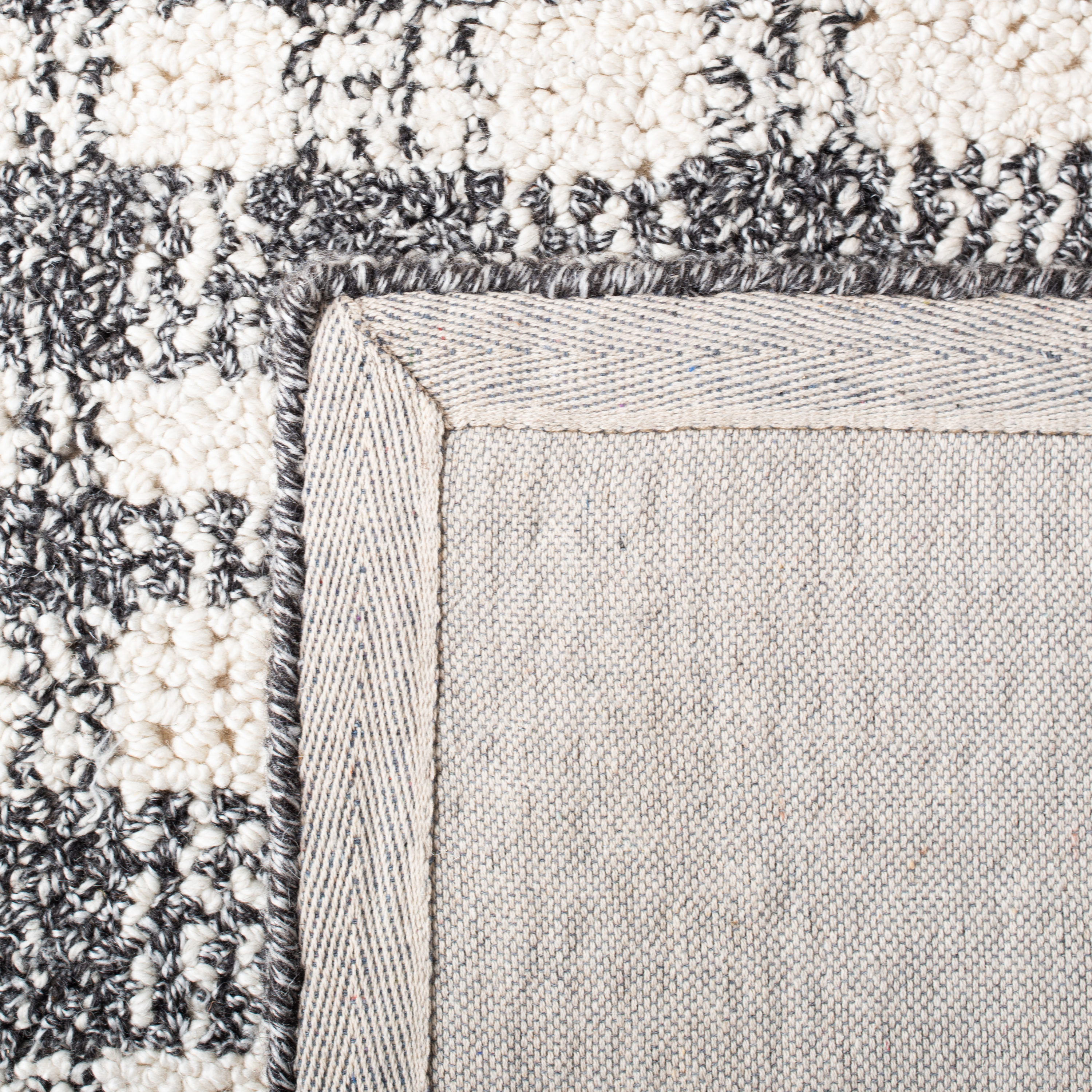 Black and Ivory Abstract Wool Viscose 4' x 6' Handmade Rug