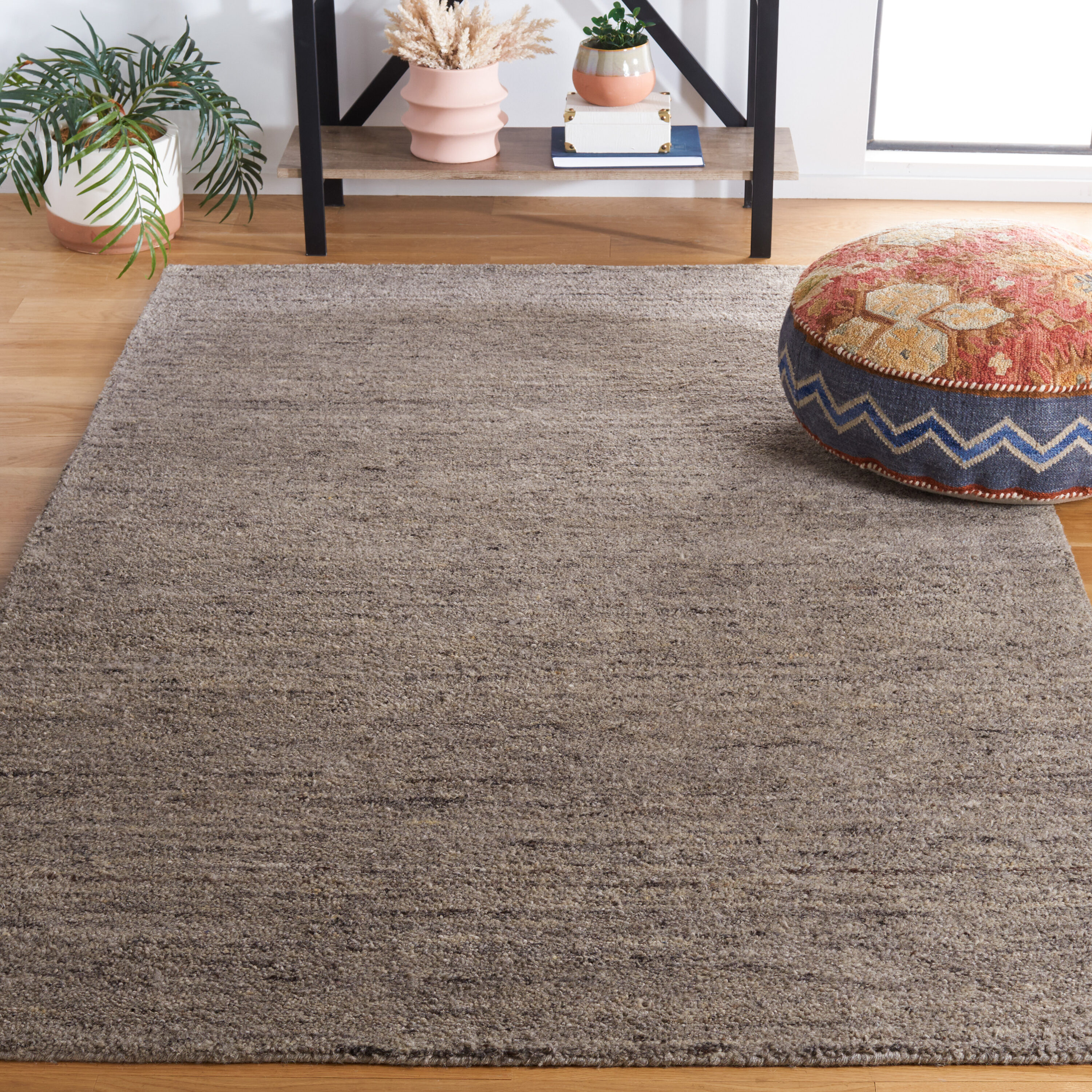 Himalaya 6 x 9 (ft) Tufted Wool Light Grey Rectangular Indoor Solid Spot Clean Only Area rug