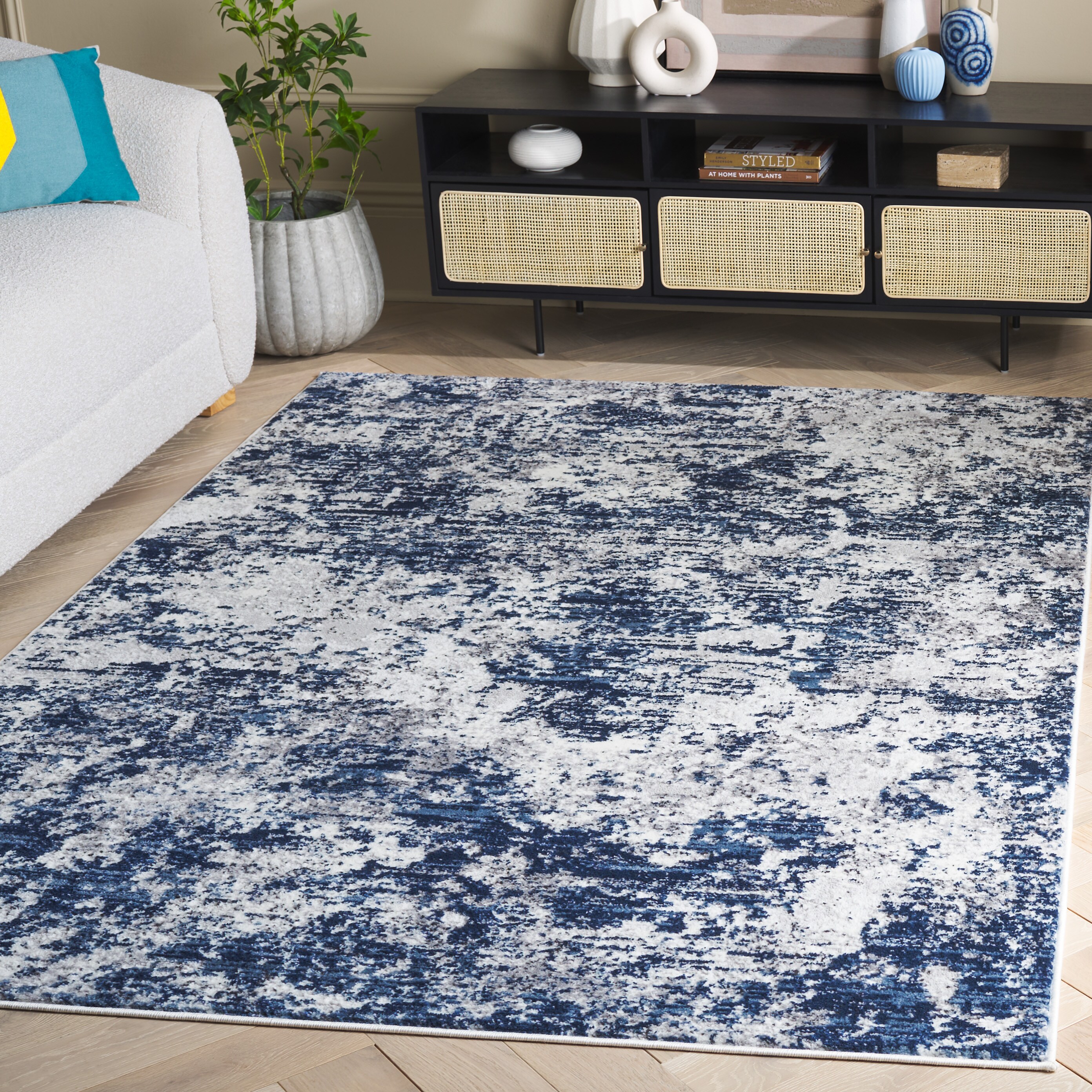 Amelia 700 5 x 8 (ft) Loomed Polypropylene Ivory/Navy Rectangular Indoor Abstract Mid-Century Modern Professionally Clean Only Area rug