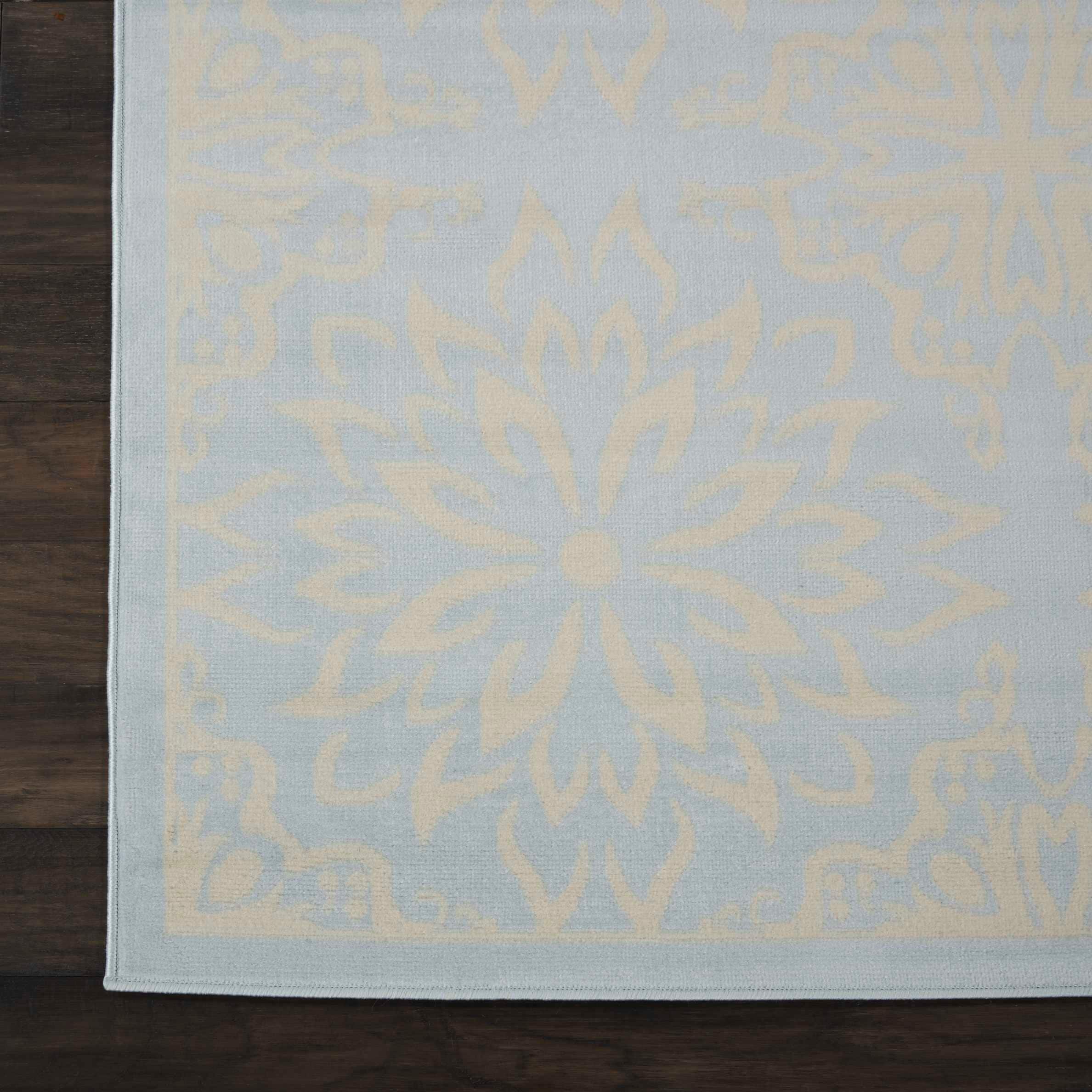 Ivory and Light Blue Floral 8' x 10' Viscose Area Rug