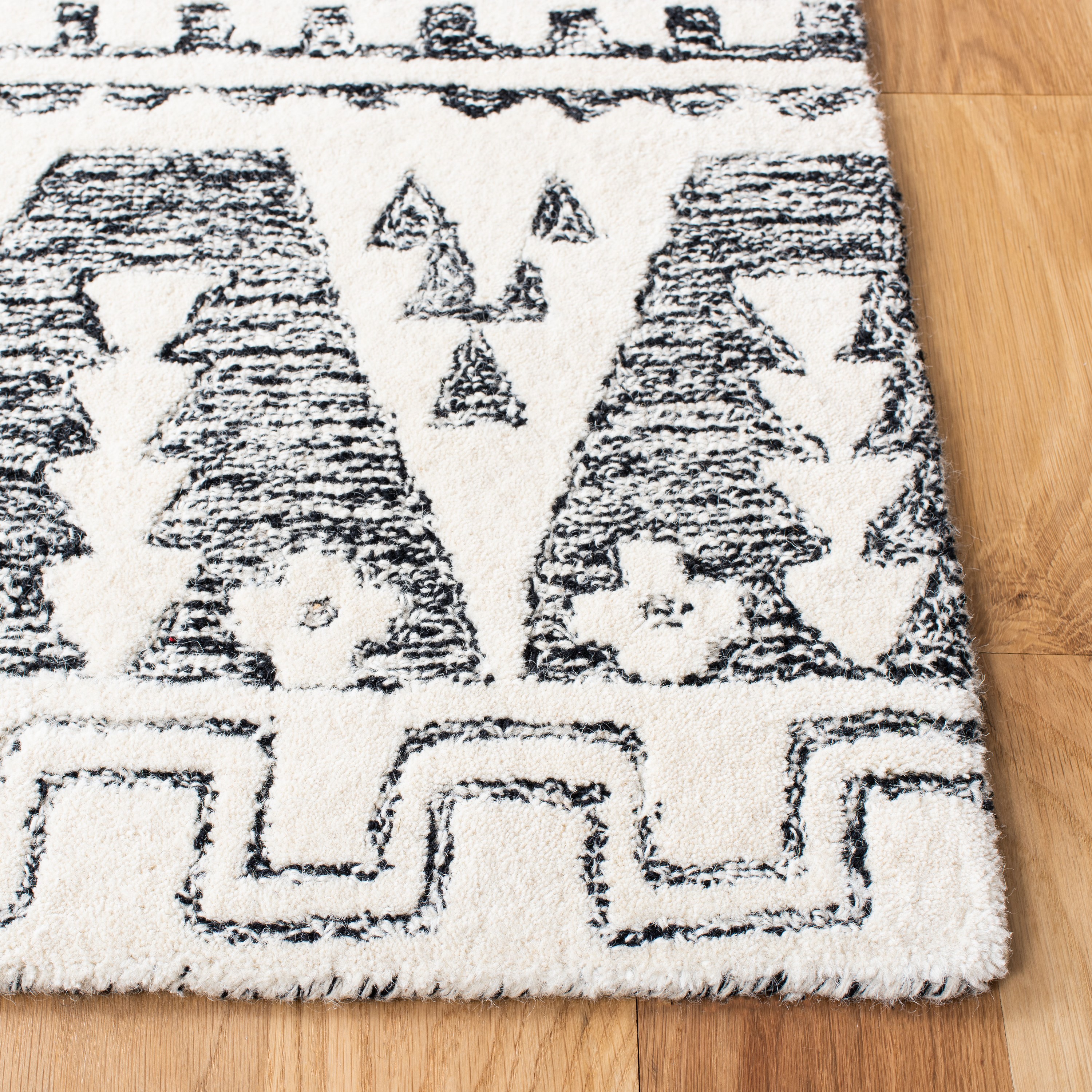 Handmade Black and Ivory Wool Abstract 9' x 12' Rug