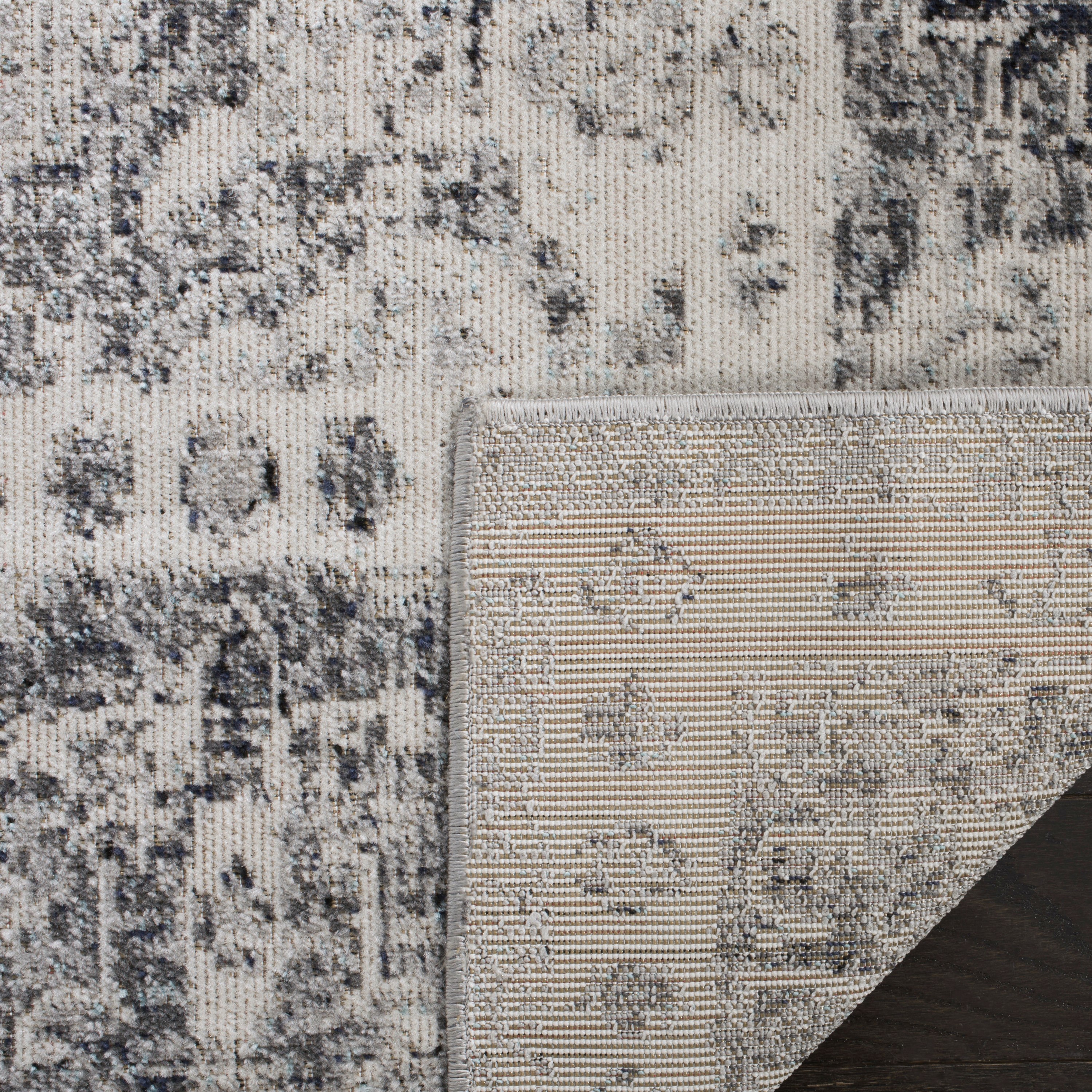 Grey and Ivory Medallion Synthetic 4' x 6' Area Rug