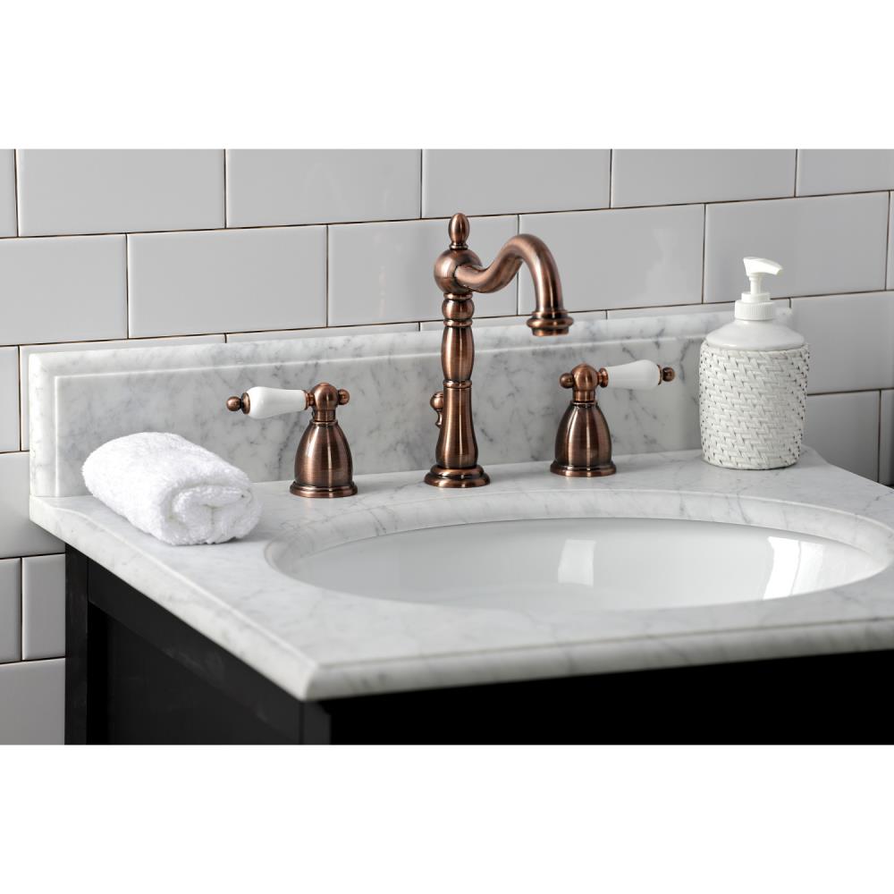 Kingston Brass Heritage Antique Copper Widespread 2 Handle Bathroom Sink Faucet With Drain In 0310