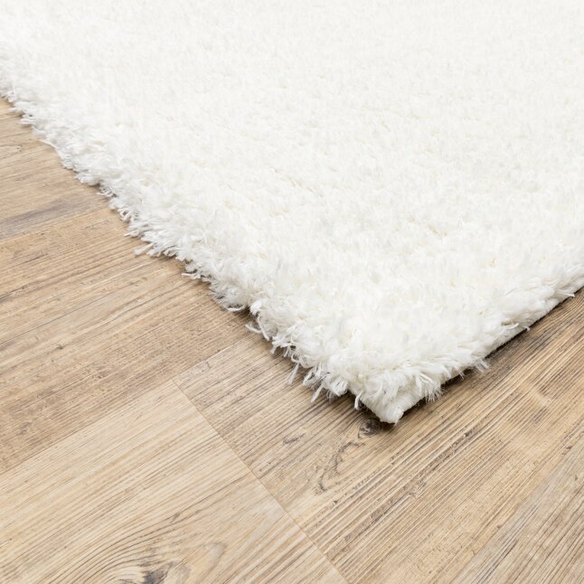 allen + roth Olearia 8 X 10 (ft) Ivory Indoor Solid Area Rug at Lowes.com