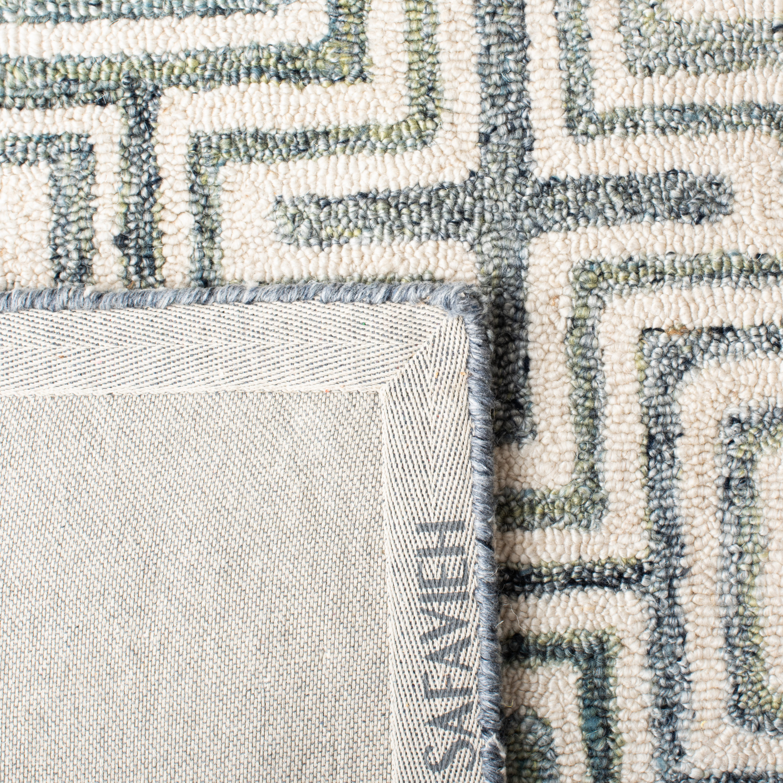 Ivory and Blue Geometric Hand-Tufted Wool Area Rug, 6' x 9'