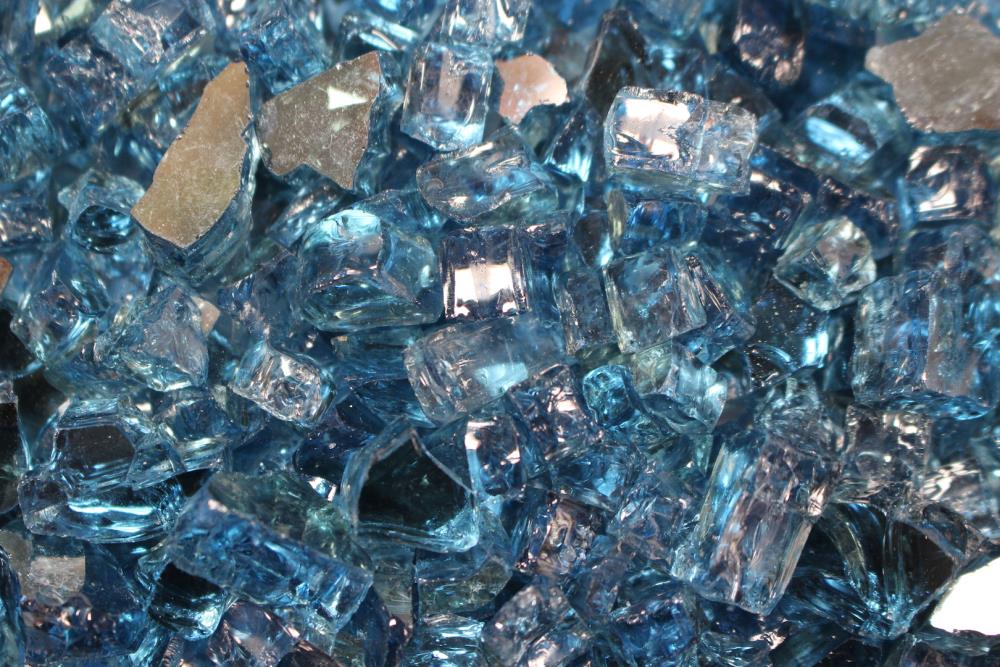 Exotic Glass EG25-R04M 25-lb Bag of Sky Blue Reflective Tempered Fire Glass - 1/4-in to 1/2-in - for Gas Fire Pit or Fireplace