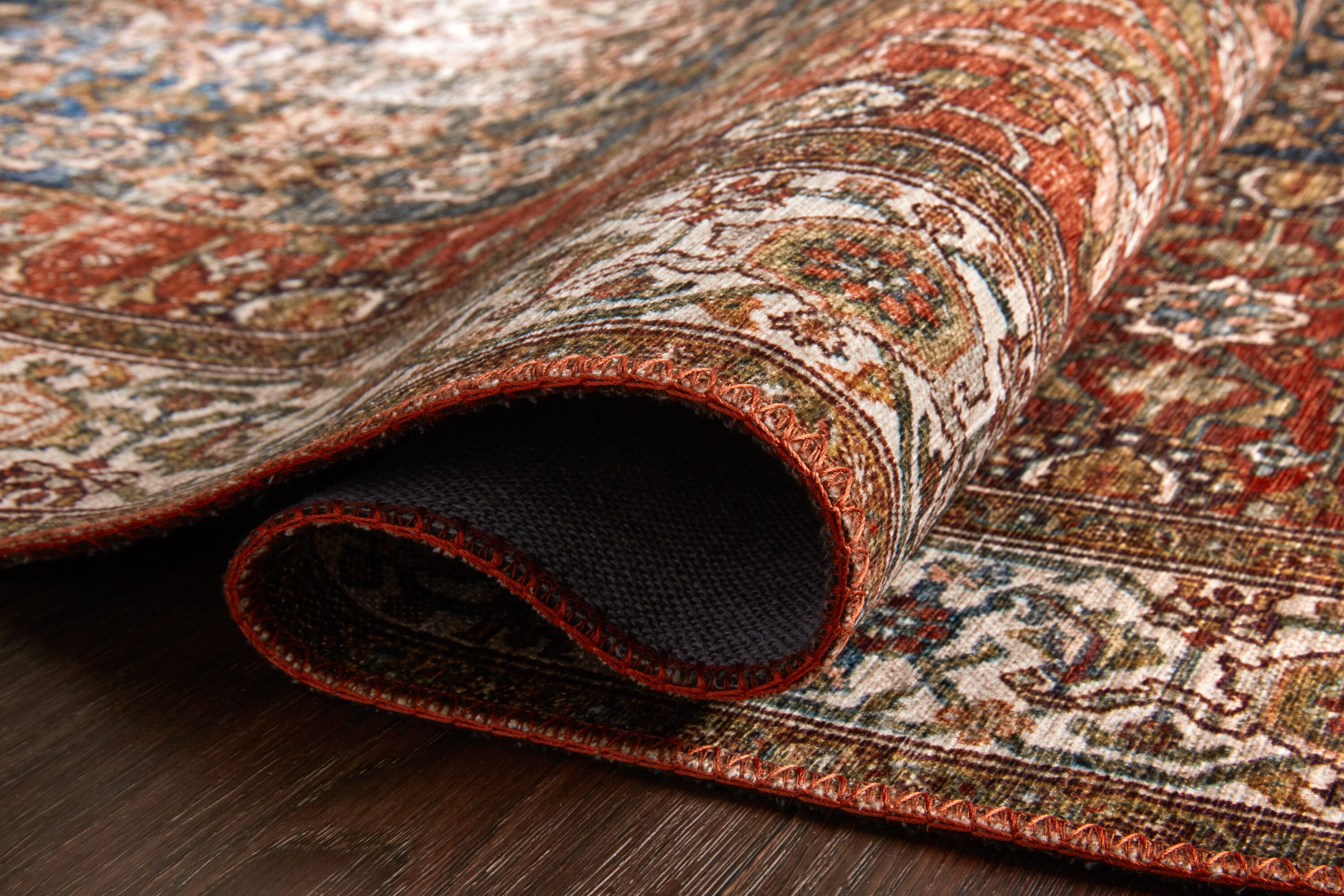 Layla 5' x 7' Blue and Red Synthetic Area Rug