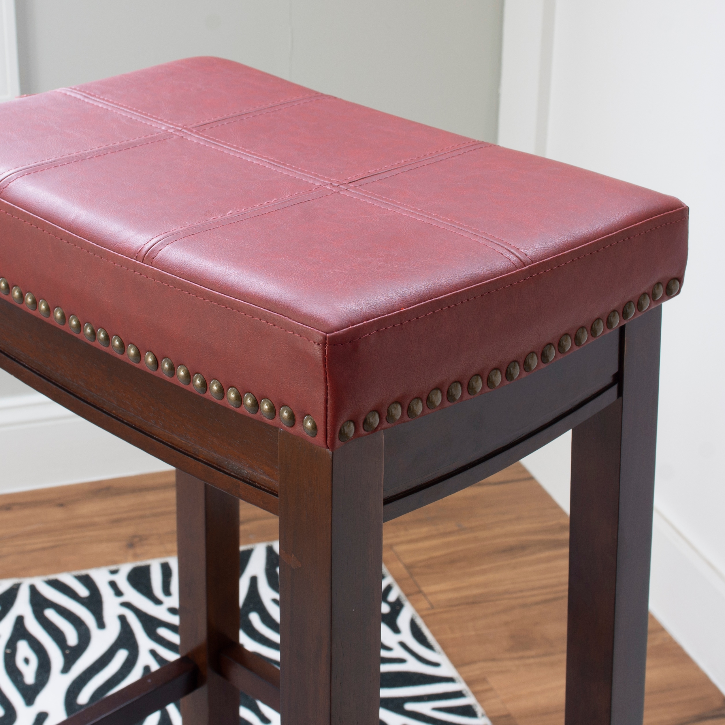 32" Dark Brown Wood Barstool with Red Faux Leather Saddle Seat