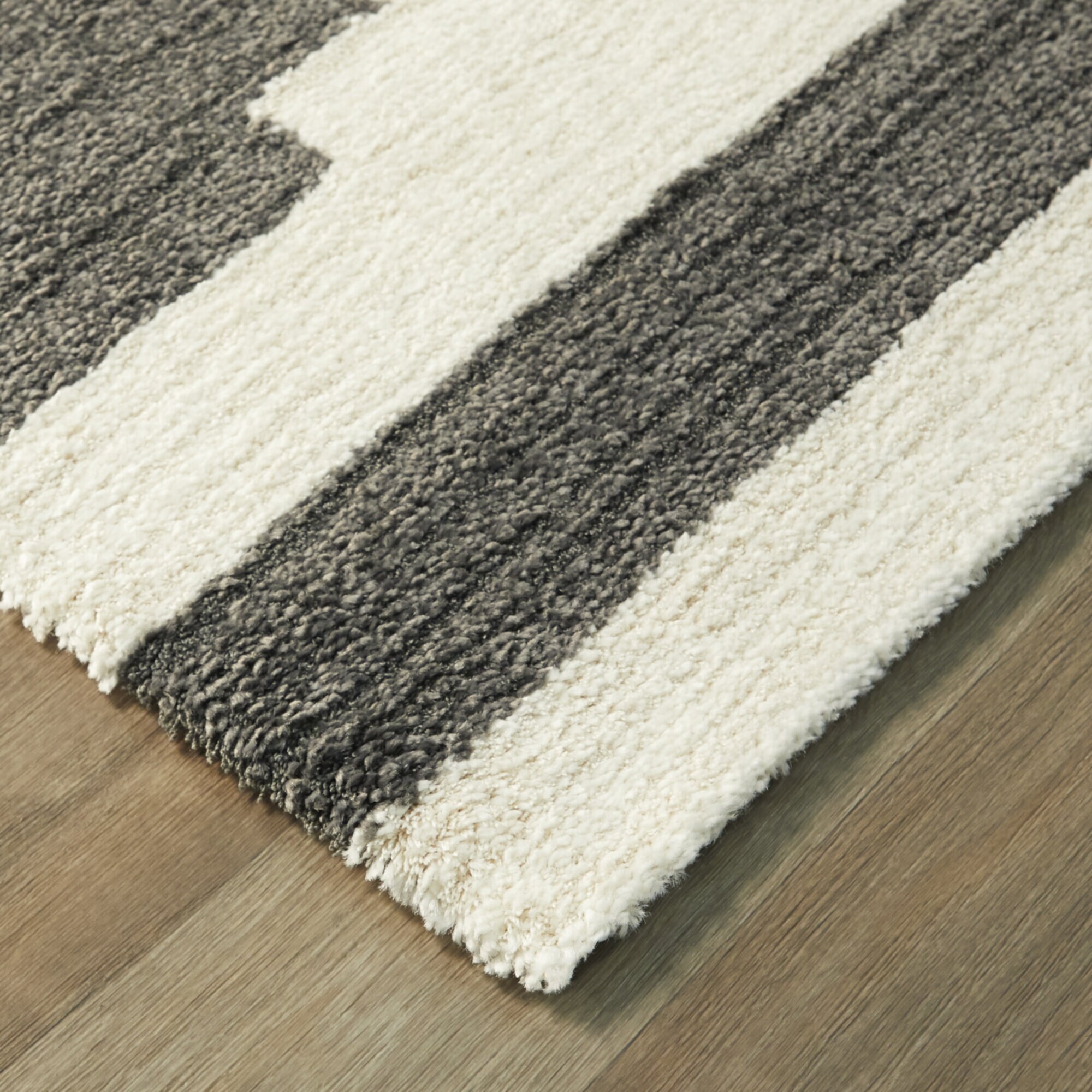 Brynja Off-White and Black Geometric Synthetic Area Rug