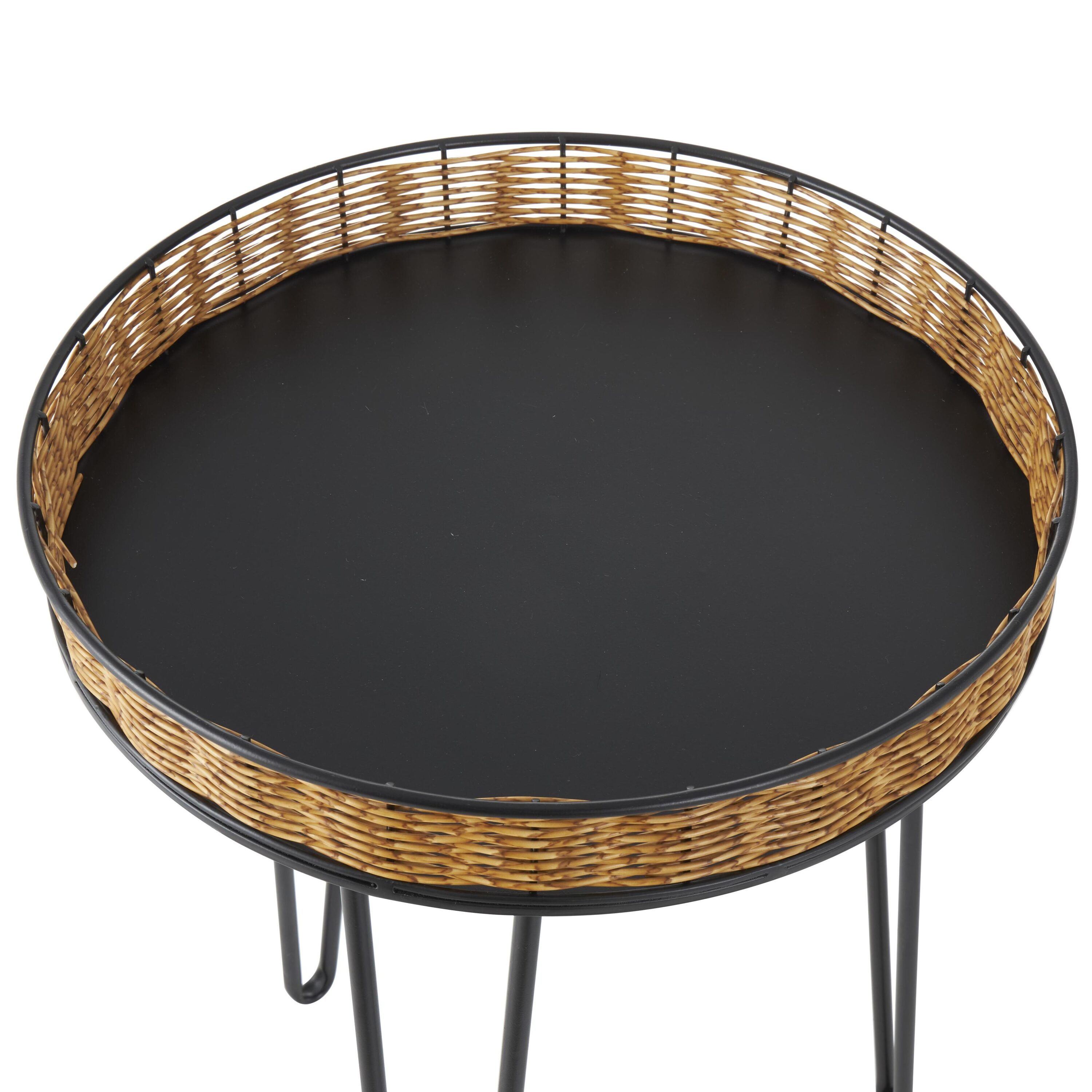 Close-up of round end table top with wicker rim and black surface
