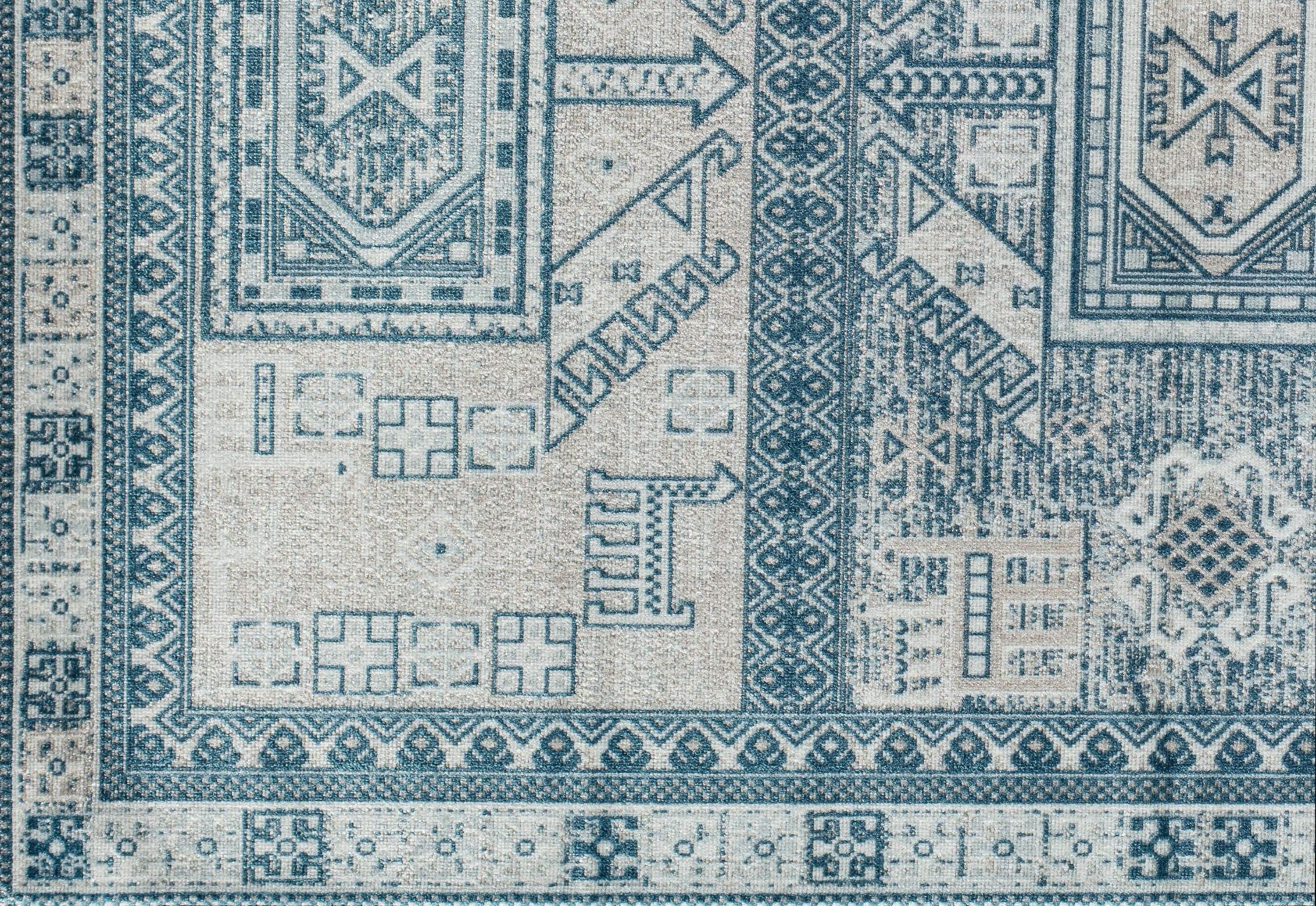 Azure Elegance 5' x 7' Reversible Blue Synthetic Area Rug