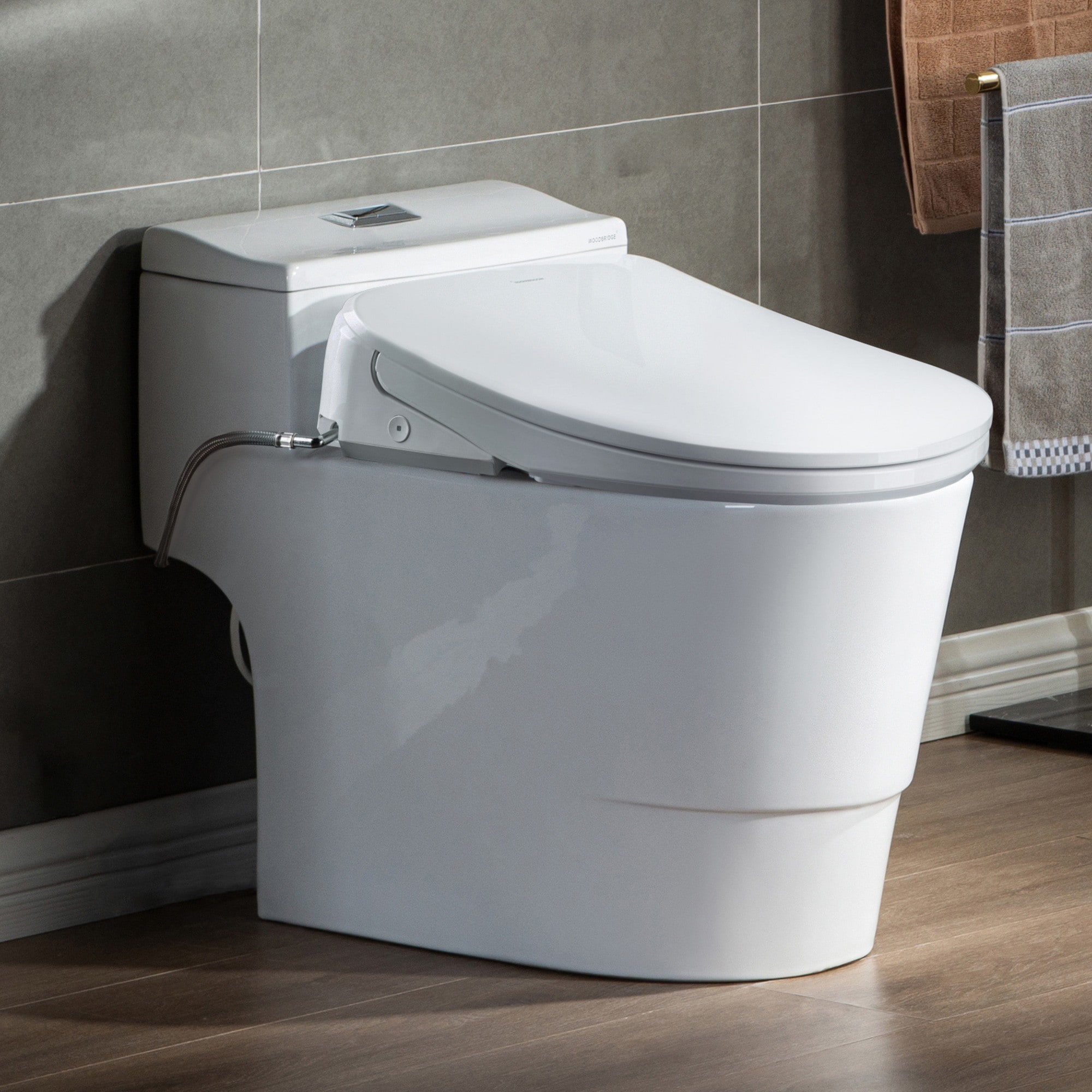 Woodbridge LT638 B0736WO+BID03 White with Chrome Button Dual Flush Elongated Standard Height Smart Soft Close 1-piece Bidet 12-in Rough-In WaterSense Labeled 1.6 GPF