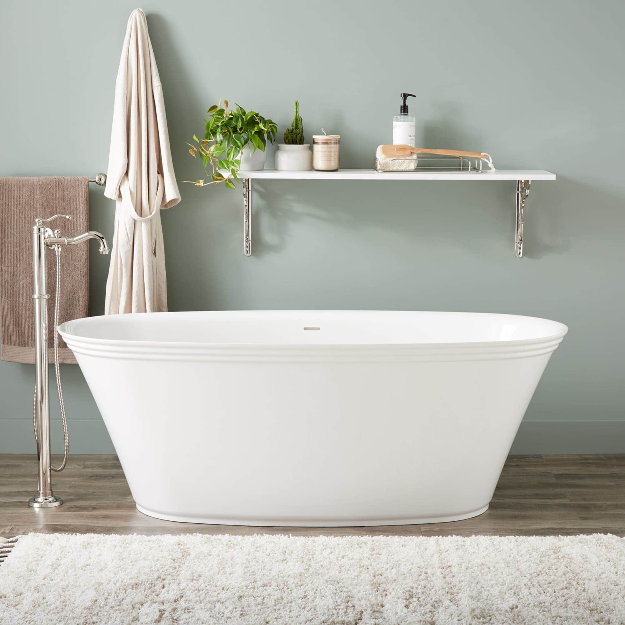Signature Hardware 450091 Doric 31.5-in x 67-in White Solid surface Oval Freestanding Soaking bathtub with Drain ( Center Drain )