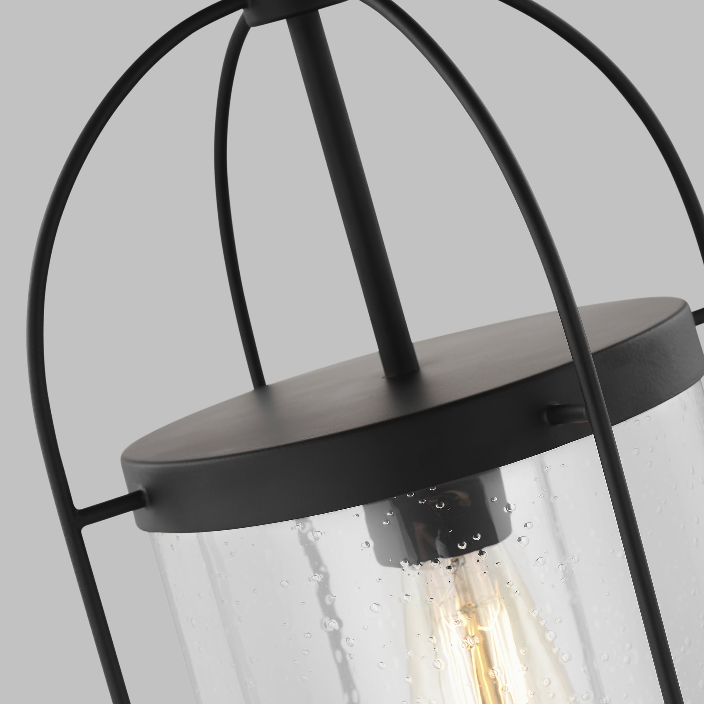 Kenny 16'' Matte Black Steel Globe Pendant with Clear Seeded Glass